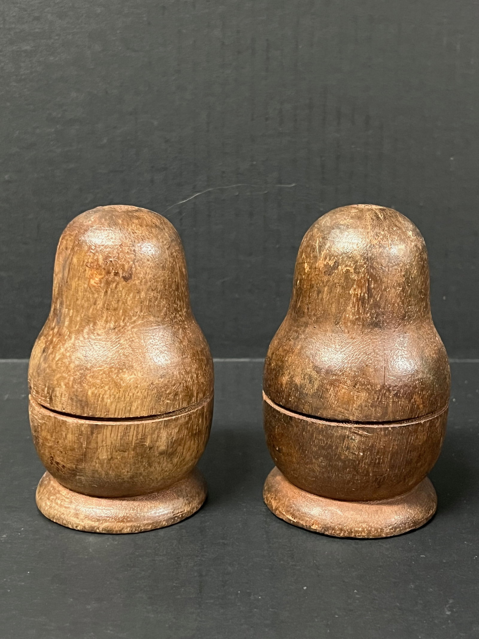 Carved Wood Nesting Doll 2 pieces: Folk Art Carved Wood Papermache Mold of Nesting Doll. The dimension is 4.75 inches high x 3 inches wide. Please be aware that some of the items are vintage, secondhand, old ages, antiques and may have
