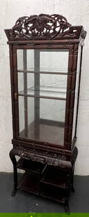 Carved Rosewood Display Cabinet: Chinese Art Carved Rosewood Display Cabinet. The dimension is 72 inches high x 26 inches wide. Please be aware that some of the items are vintage, secondhand, old ages, antiques and may have a defects