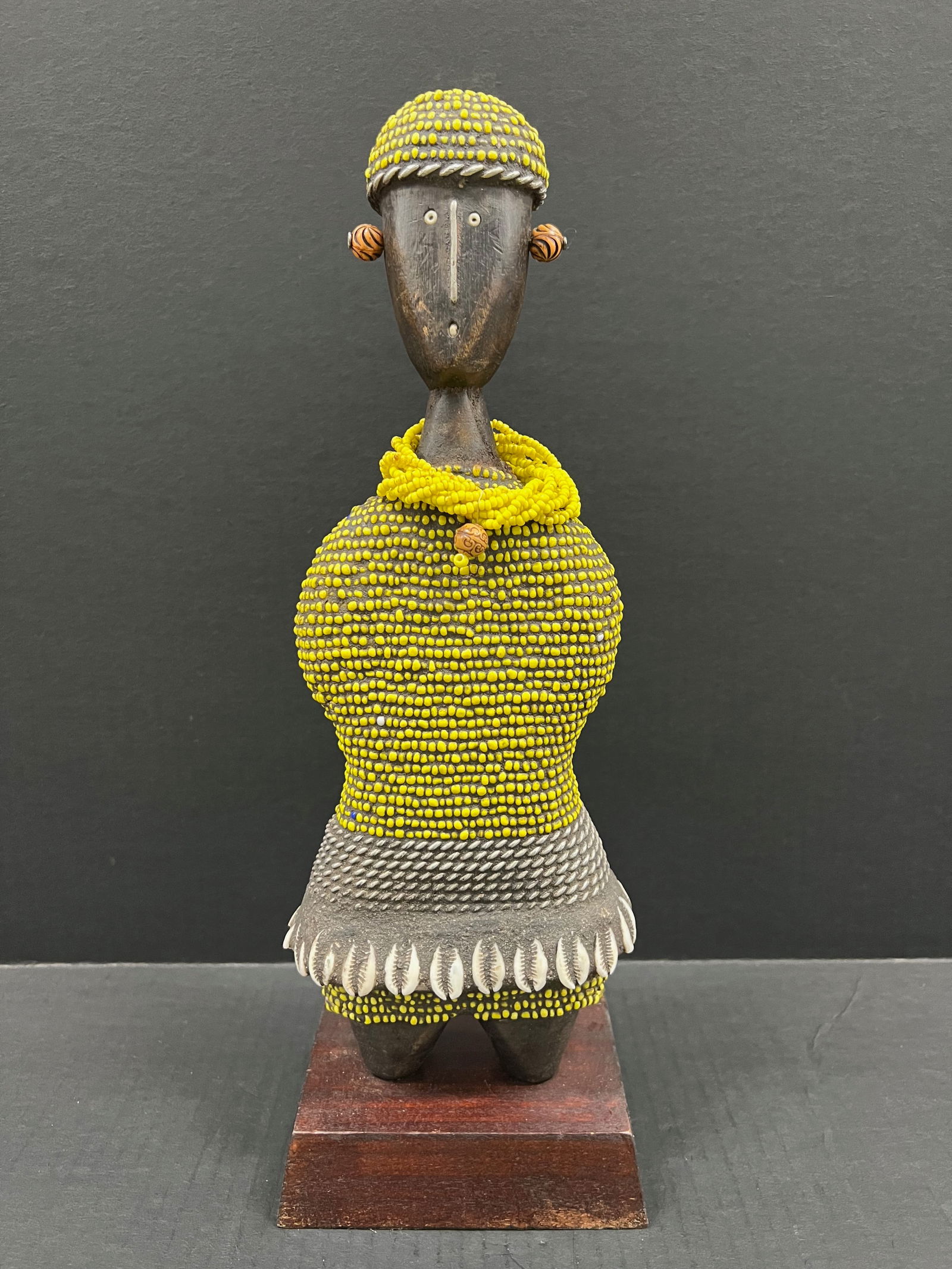 Namji Beaded Doll: African Tribal Art Namji Beaded Doll. The dimension is 15.5 inches high x 5.5 inches wide. Please be aware that some of the items are vintage, secondhand, old ages, antiques and may have a defects or