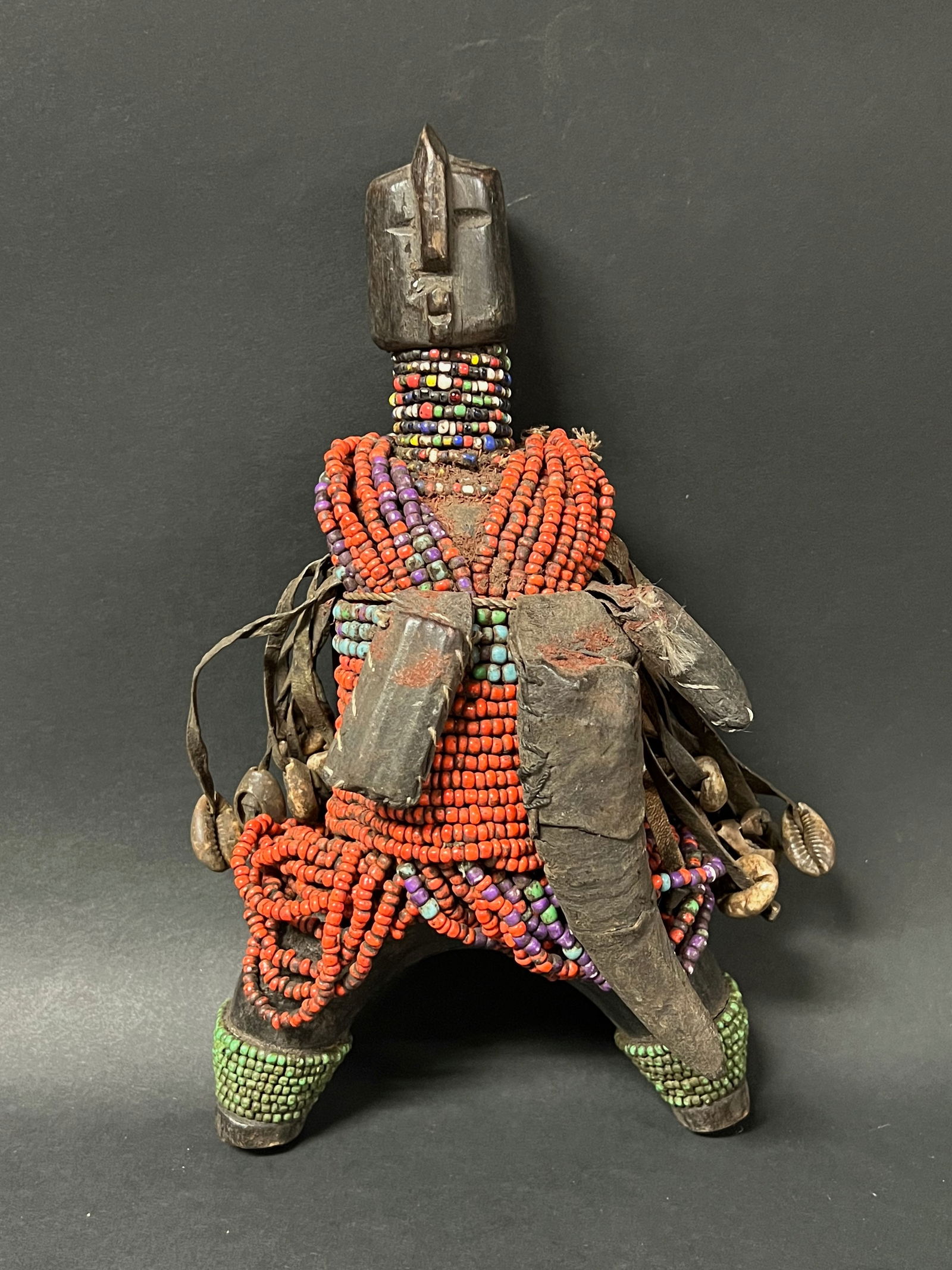 Namji Beaded Doll Statue: African Tribal Art Namji Beaded Doll Statue. The dimension is 10.5 inches high x 5 inches wide. Please be aware that some of the items are vintage, secondhand, old ages, antiques and may have a defect