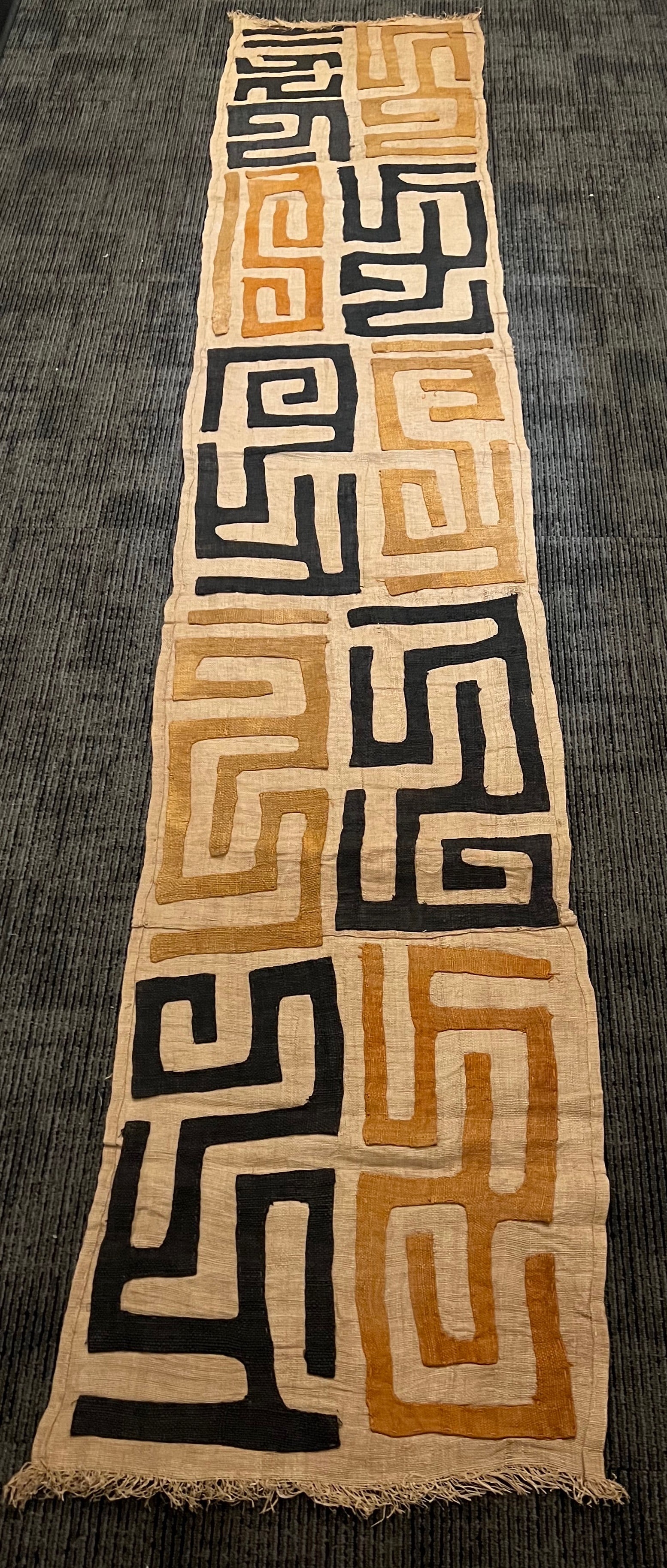Kuba Cloth: African Tribal Art Kuba Cloth. The dimension is 112 inches high x 21 inches wide. Please be aware that some of the items are vintage, secondhand, old ages, antiques and may have a defects or sign of a
