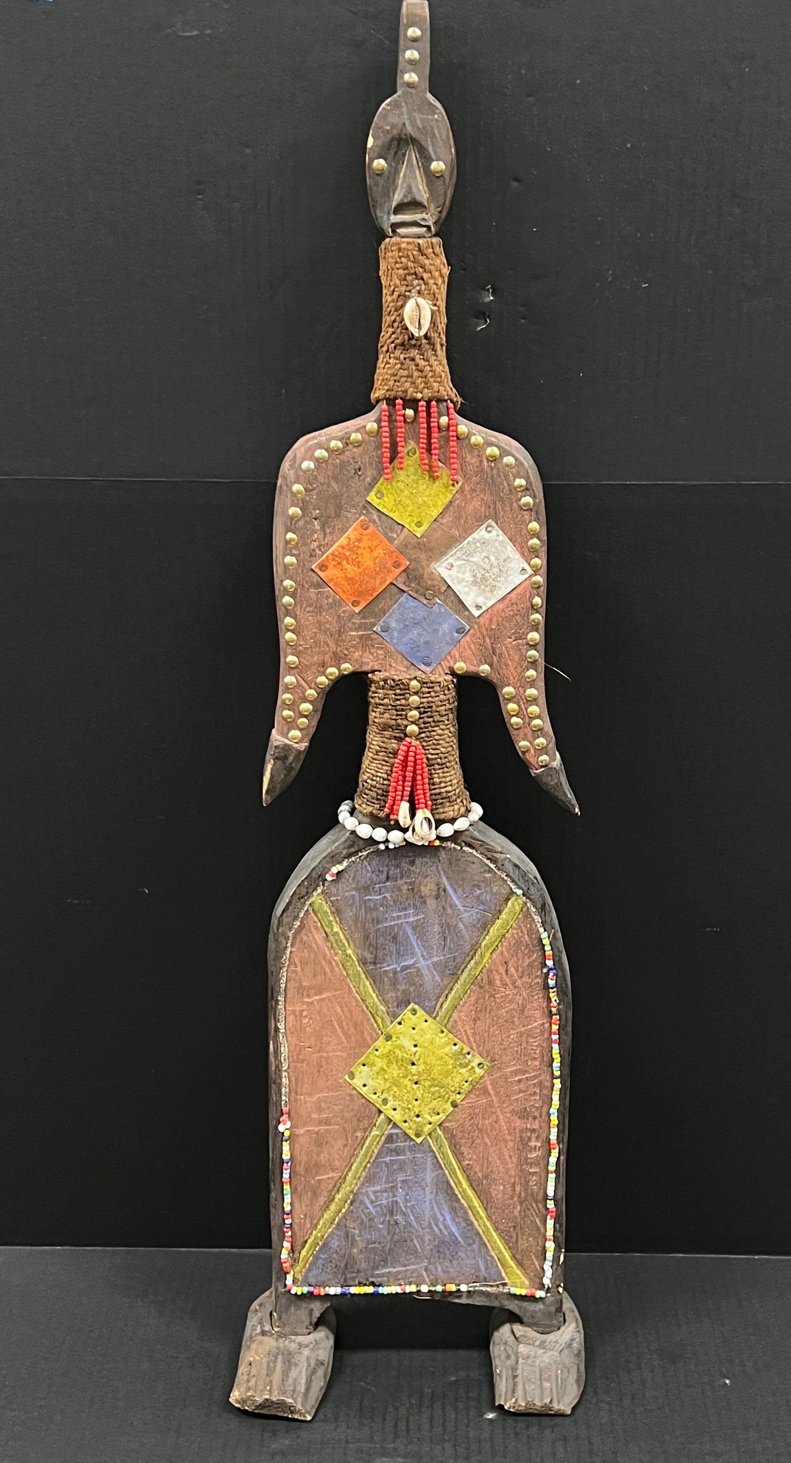 Namji Beaded Doll Statue: African Tribal Art Namji Beaded Doll Statue. The dimension is 35 inches high x 9.5 inches wide. Please be aware that some of the items are vintage, secondhand, old ages, antiques and may have a defect