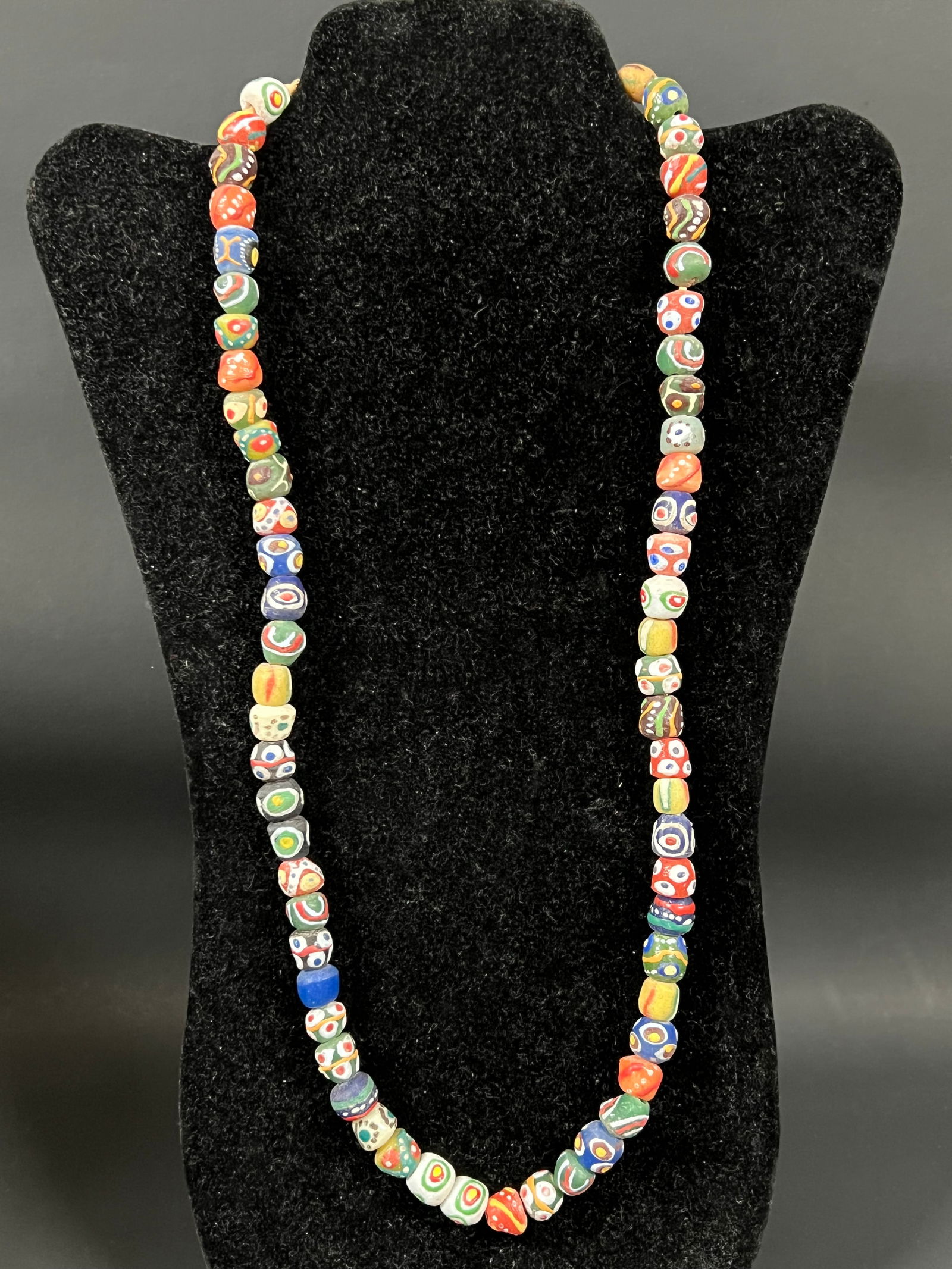 Batik Beaded Necklace: African Tribal Art Batik Beaded Necklace. The dimension is 28 rounds. Please be aware that some of the items are vintage, secondhand, old ages, antiques and may have a defects or sign of ages, However