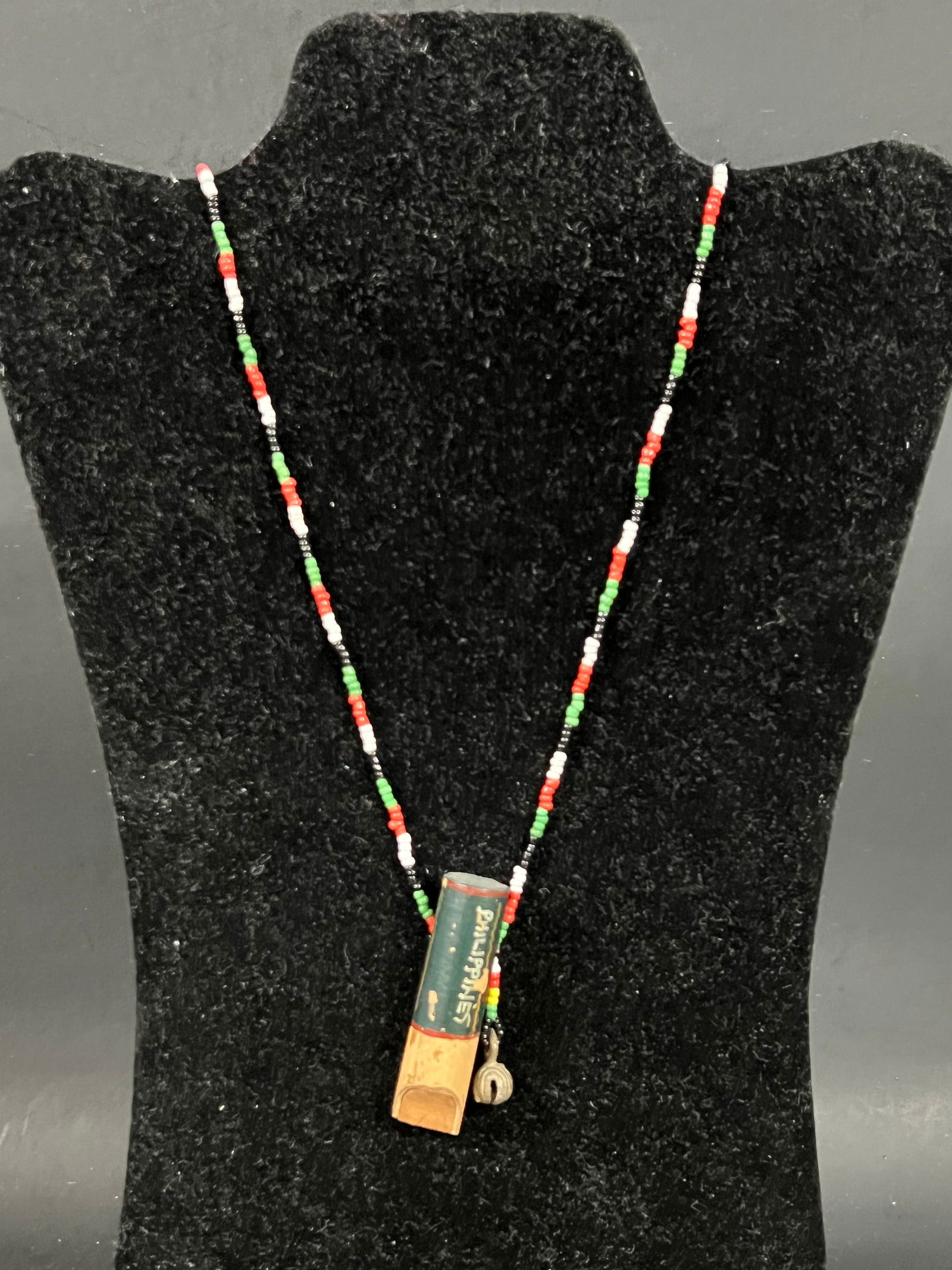 Philippine Ilongot Beaded Necklace: Tribal Art Philippine Ilongot Beaded Necklace. The dimension is 18 inches high x 2 inches wide. Please be aware that some of the items are vintage, secondhand, old ages, antiques and may have a defect