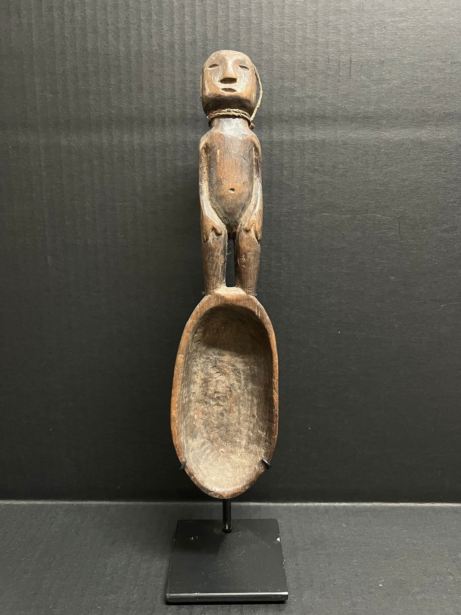 Philippine Ifugao Wooden Figural Spoon with Stand: Tribal Art Philippine Ifugao Wooden Figural Spoon with stand. The dimension is 11.5 inches high x 3 inches wide. Please be aware that some of the items are vintage, secondhand, old ages, antiques and