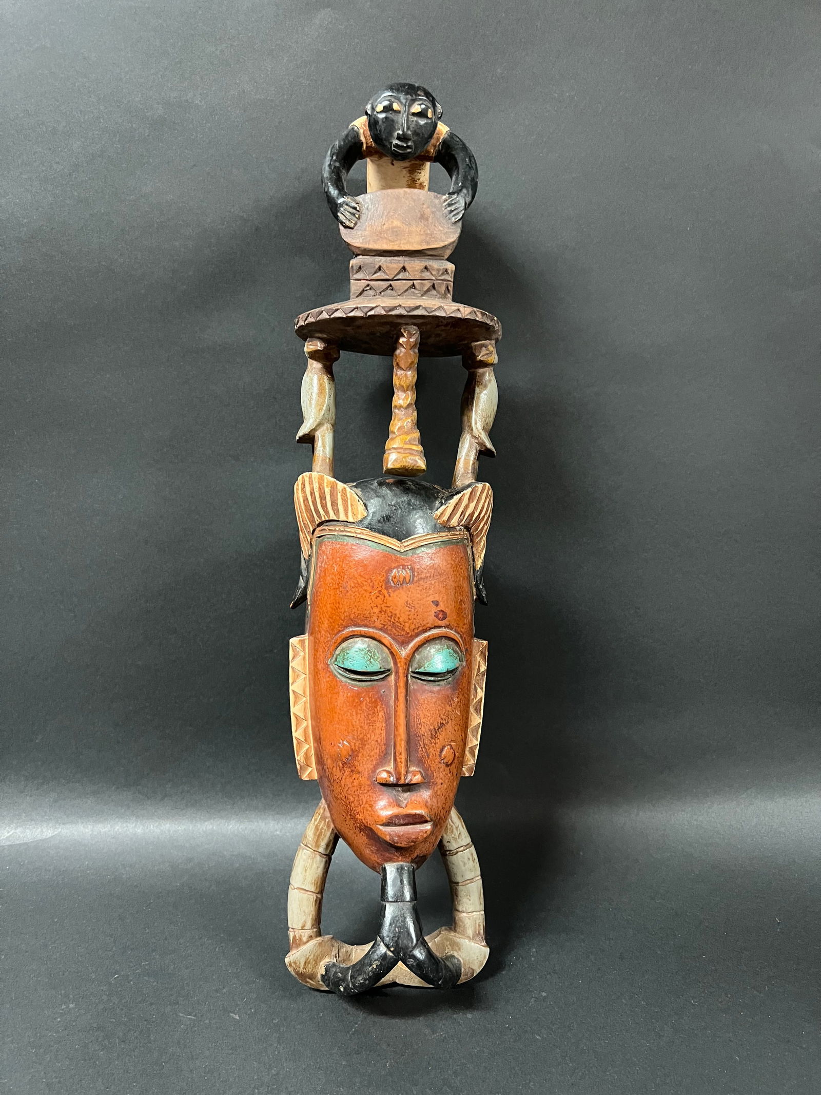 Guru Mask: African Tribal Art Guru Mask. The dimension is 18 inches high x 4.5 inches wide. Please be aware that some of the items are vintage, secondhand, old ages, antiques and may have a defects or sign of ag