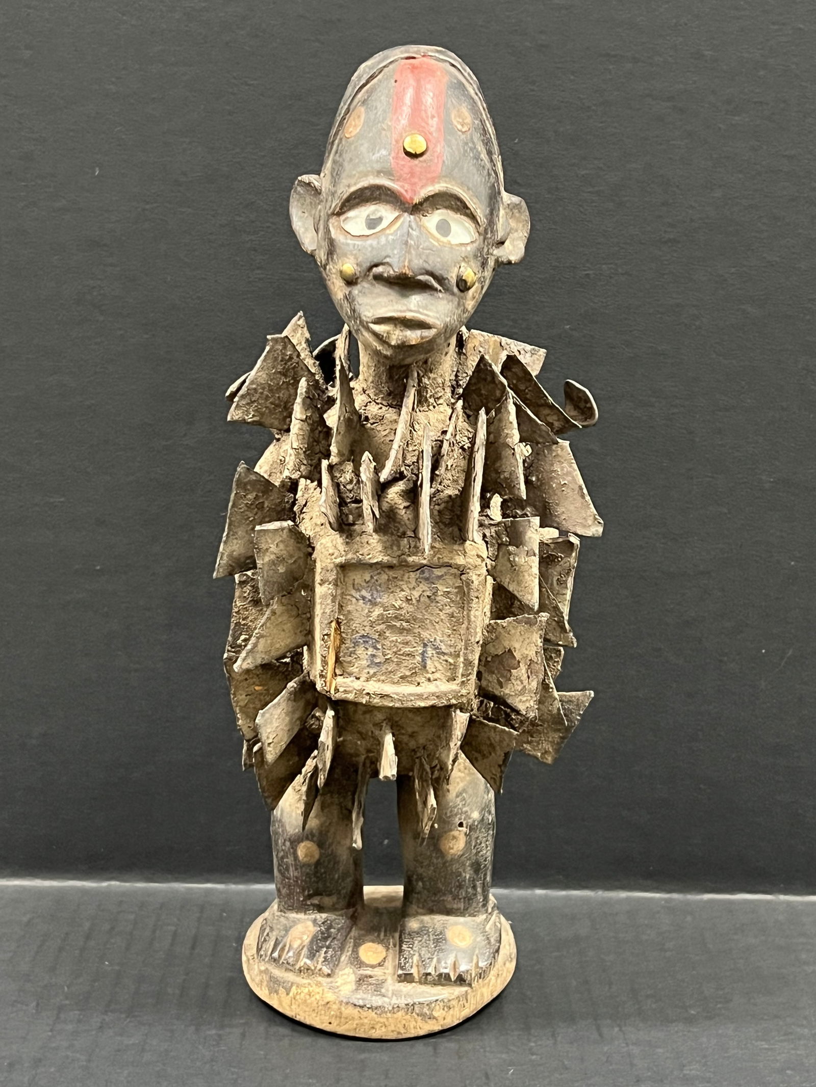 Bacongo Nail Fetish: African Tribal Art Carved Wood Bacongo Nail Fetish. The dimension is 13.5 inches high x 4.5 inches wide. Please be aware that some of the items are vintage, secondhand, old ages, antiques and may have