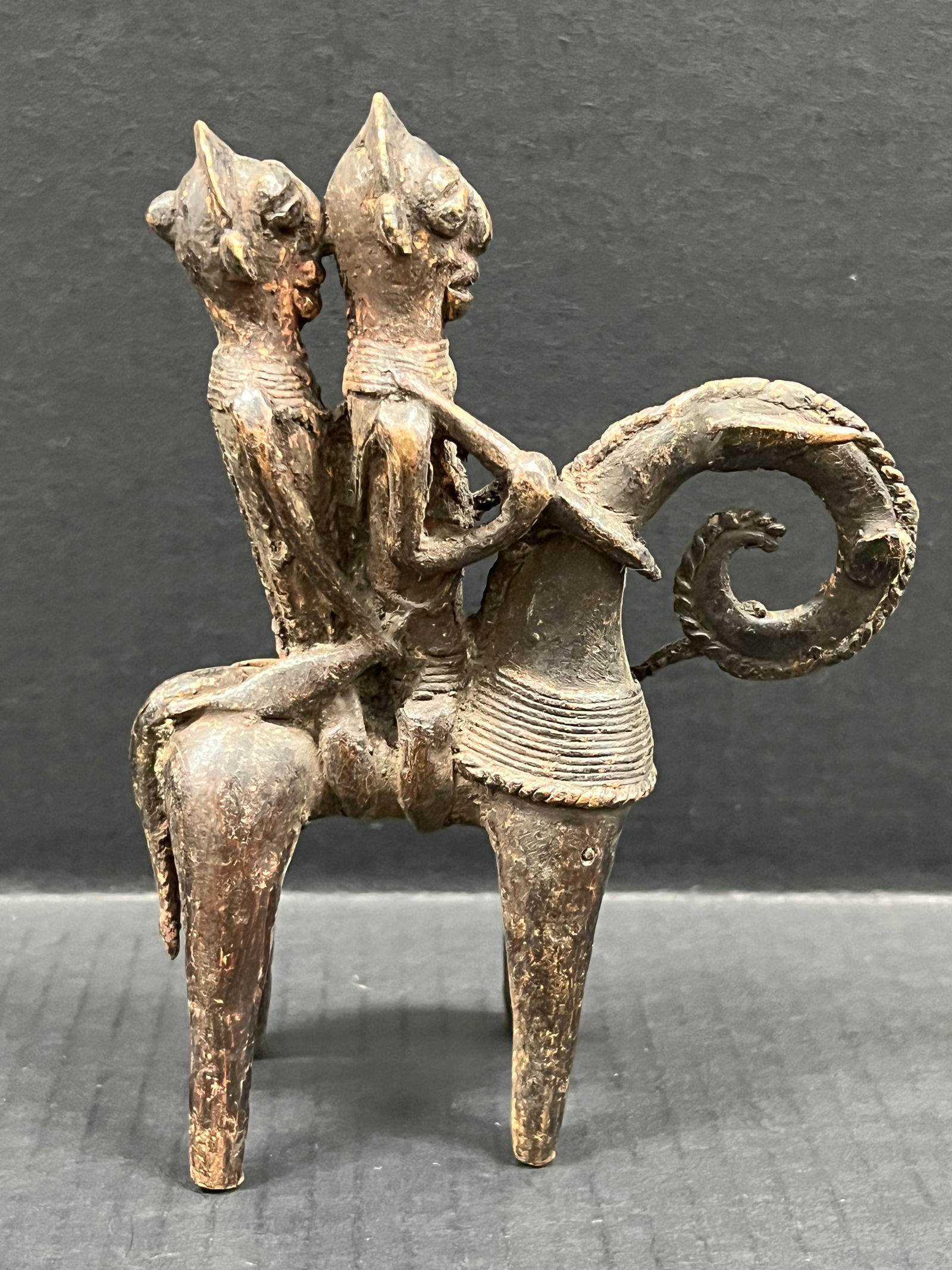 Bronze Kotoko Horseman Sculpture: African Tribal Art Bronze Kotoko Horseman Sculpture. The dimension is 7 inches high x 2 inches depth x 5.5 inches wide. Please be aware that some of the items are vintage, secondhand, old ages, antiqu