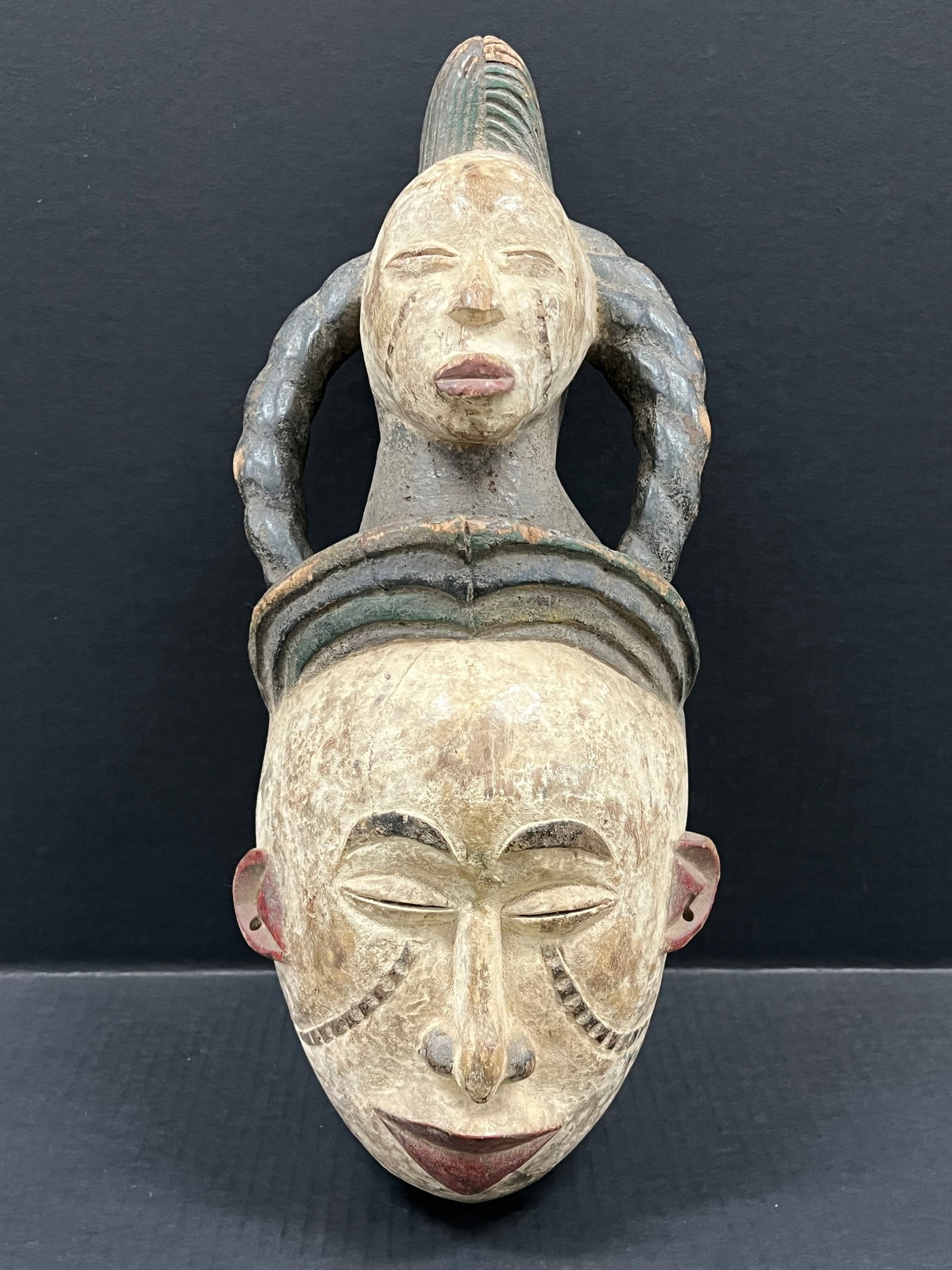 Ibo Mask: African Tribal Art Ibo Mask. The dimension is 18 inches high x 8 inches wide. Please be aware that some of the items are vintage, secondhand, old ages, antiques and may have a defects or sign of ages,