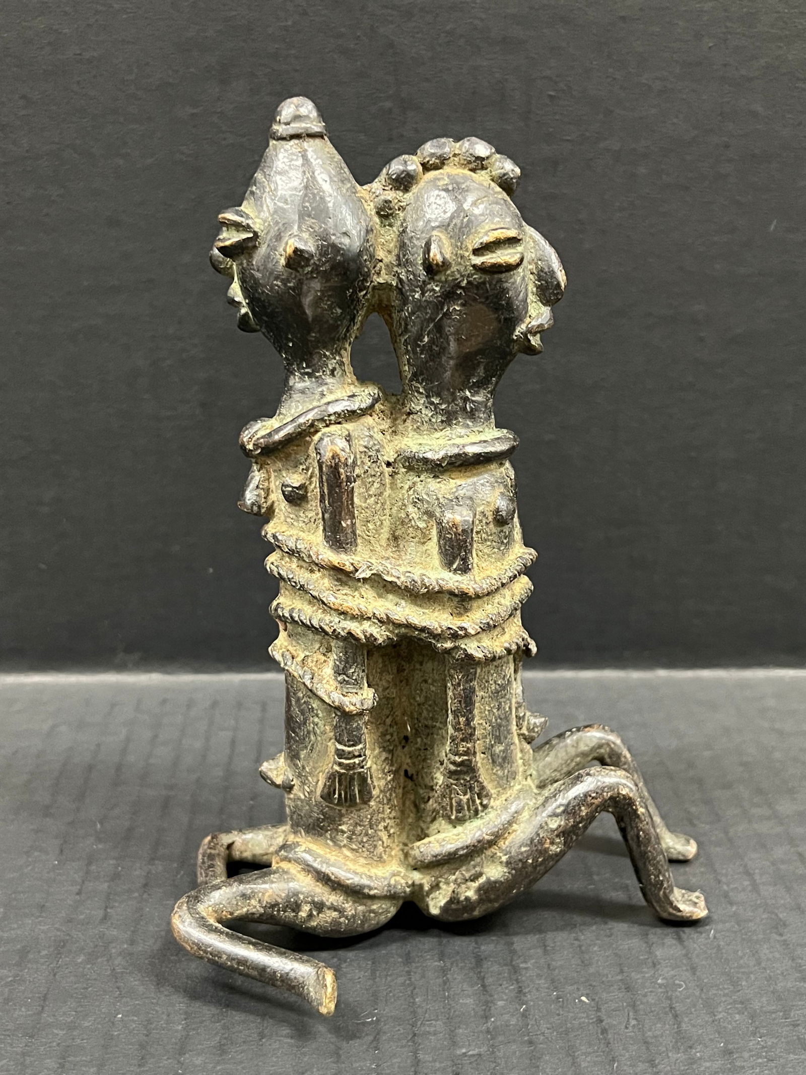 Chad Bronze Statue: African Tribal Art Chad Bronze Statue. The dimension is 7.5 inches high x 5.5 inches wide. Please be aware that some of the items are vintage, secondhand, old ages, antiques and may have a defects or