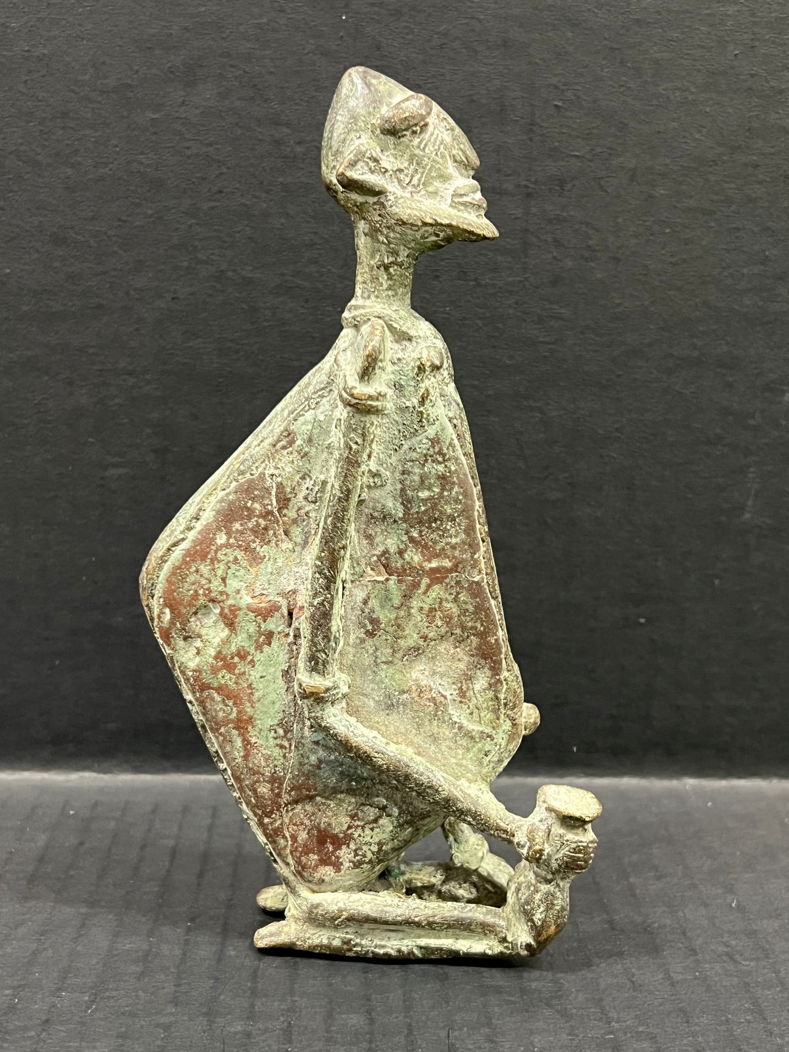 Dogon Statue: African Tribal Art Dogon Statue. The dimension is 7.5 inches high x 4 inches wide. Please be aware that some of the items are vintage, secondhand, old ages, antiques and may have a defects or sign of