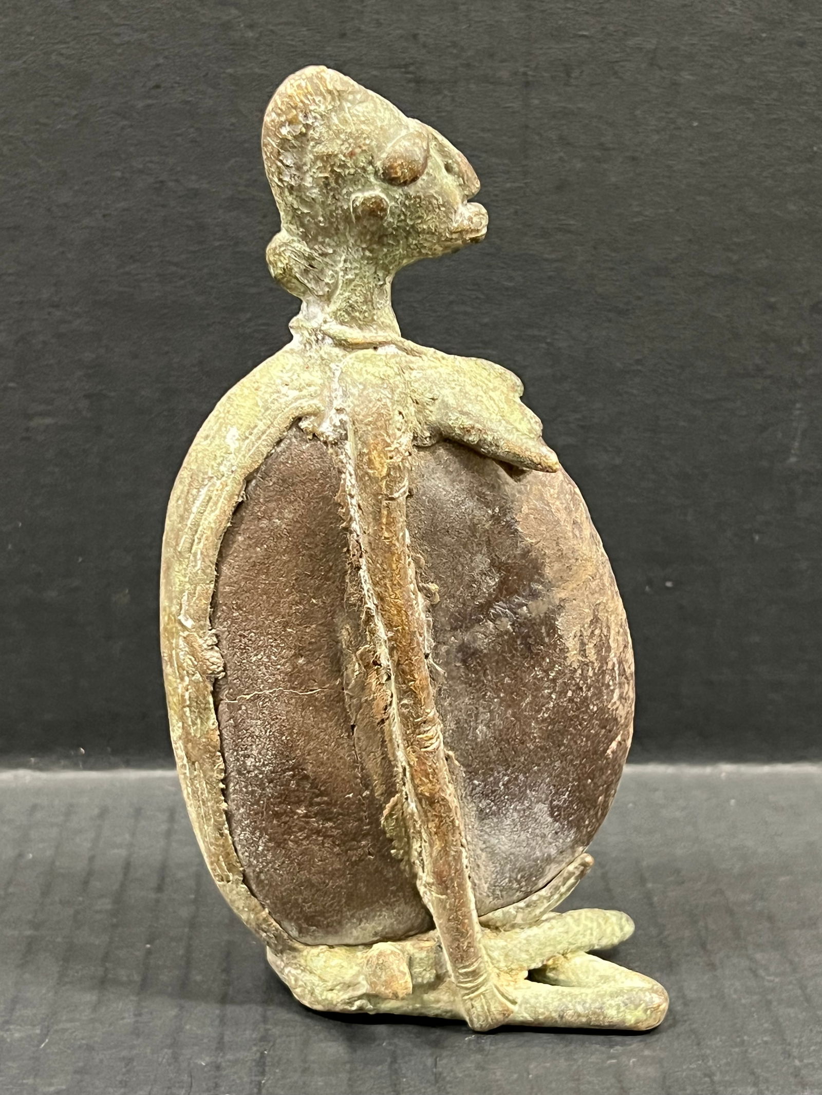 Dogon Bronze Statue: African Tribal Art Dogon Bronze Statue. The dimension is 7 inches high x 4 inches wide. Please be aware that some of the items are vintage, secondhand, old ages, antiques and may have a defects or sig