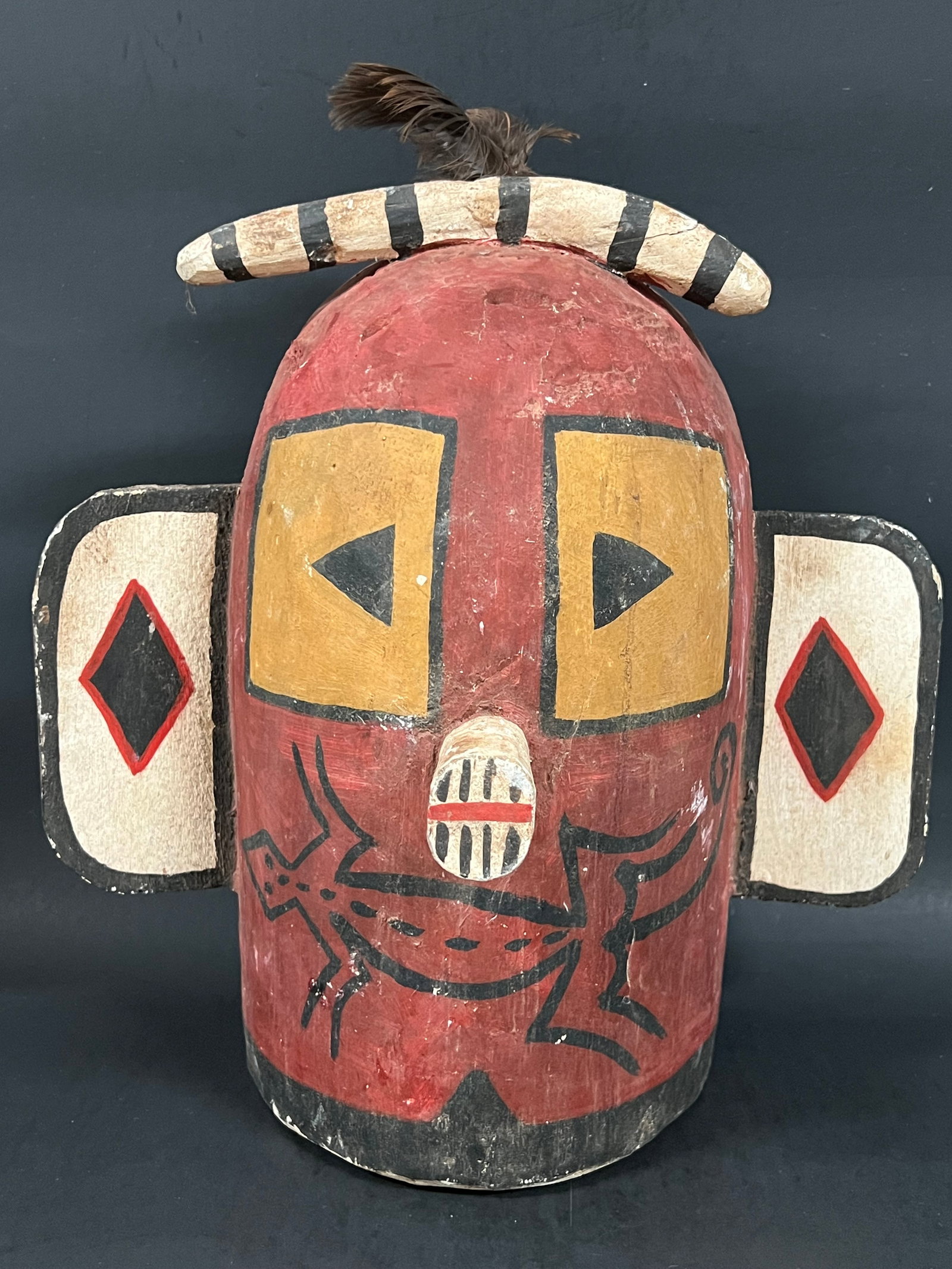 Kachina Mask: African Tribal Art Kachina Mask. The dimension is 12 inches high x 7 inches depth x 12 inches wide. Please be aware that some of the items are vintage, secondhand, old ages, antiques and may have a de