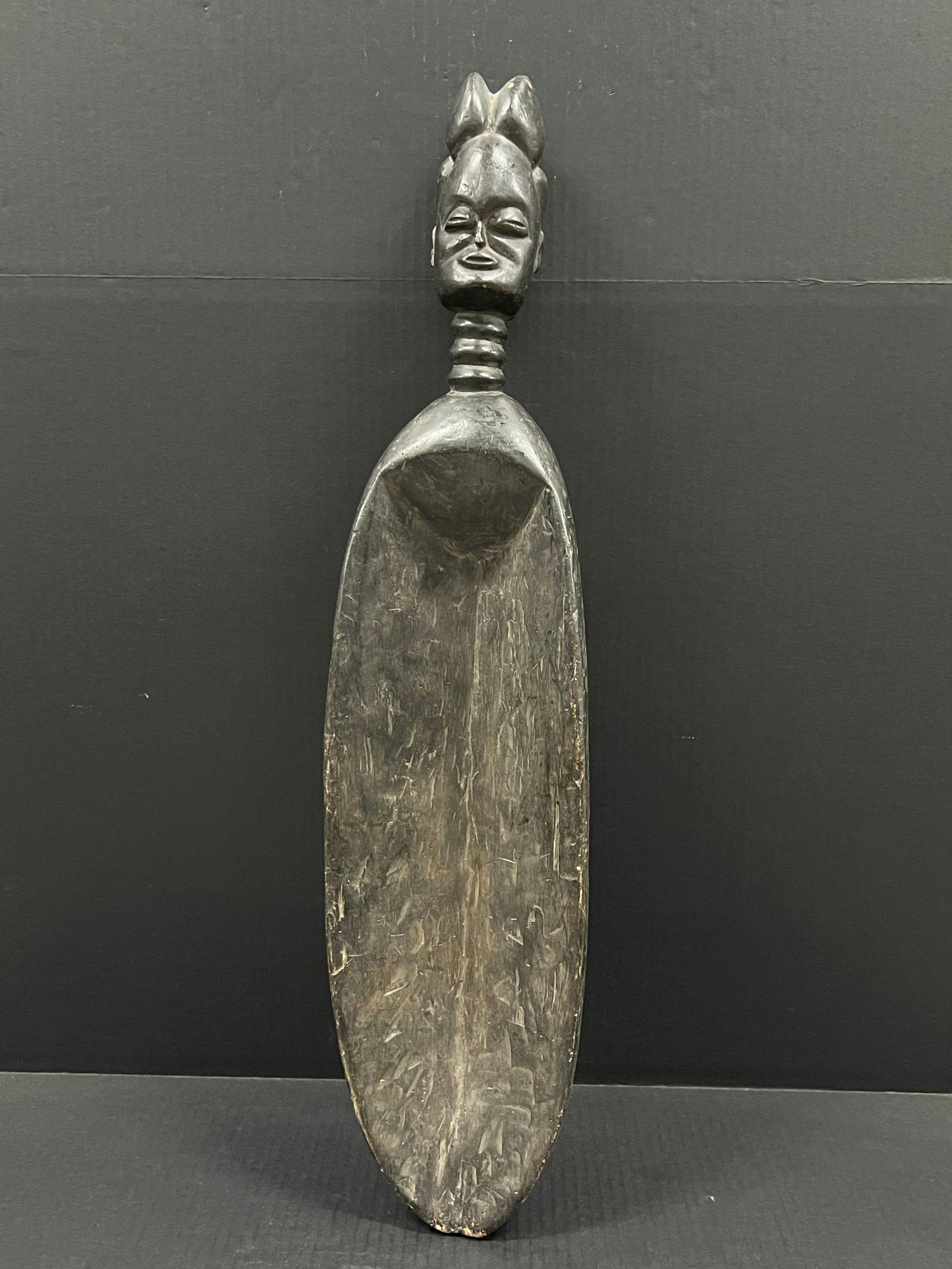 Large Makonde Spoon: African Tribal Art Large Makonde Spoon. The dimension is 30 inches high x 7 inches wide. Please be aware that some of the items are vintage, secondhand, old ages, antiques and may have a defects or si