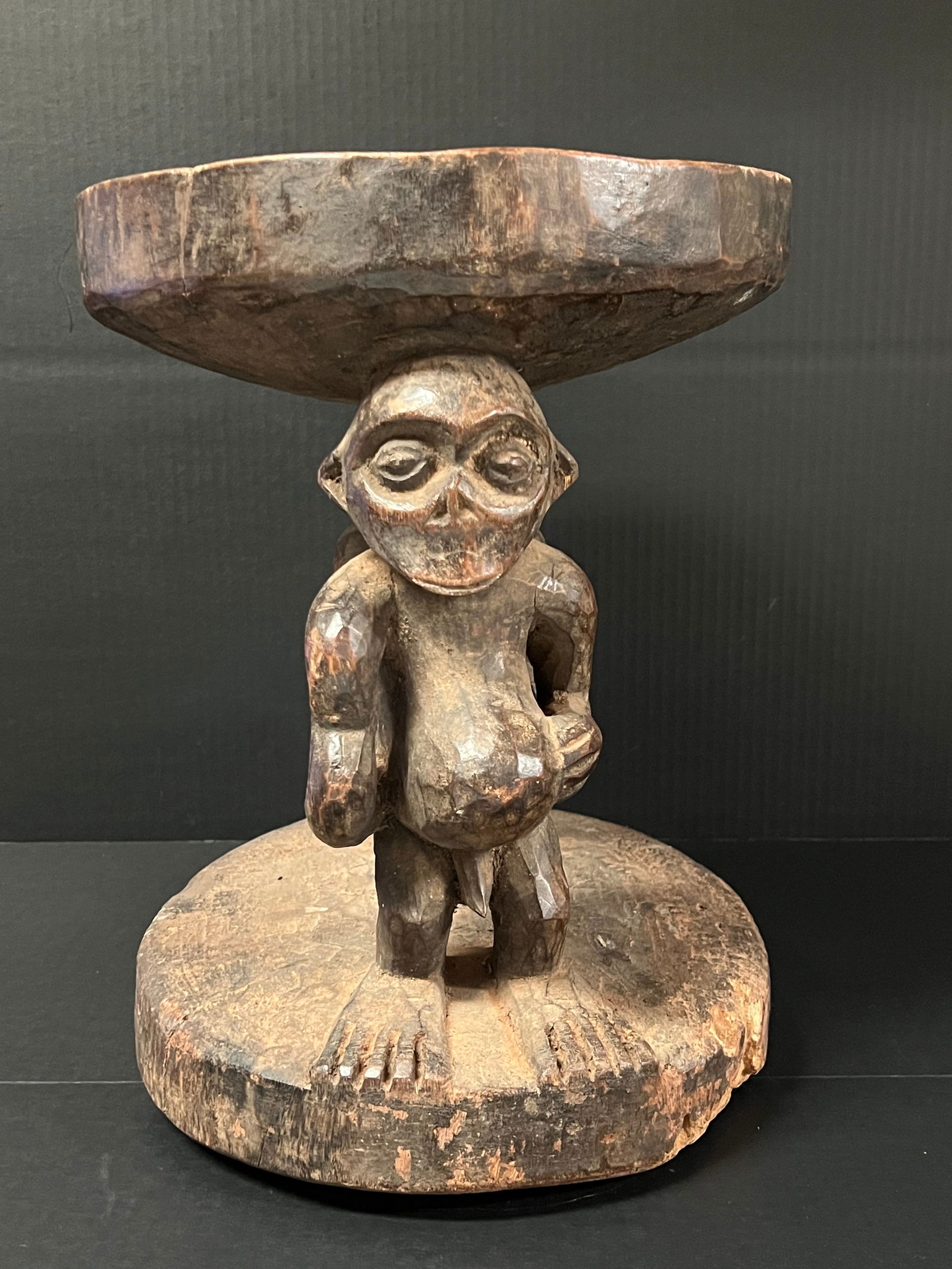 Bamileke Stool: African Tribal Art Bamileke Stool. The dimension is 15 inches high x 11 inches depth x 12.5 inches wide. Please be aware that some of the items are vintage, secondhand, old ages, antiques and may have