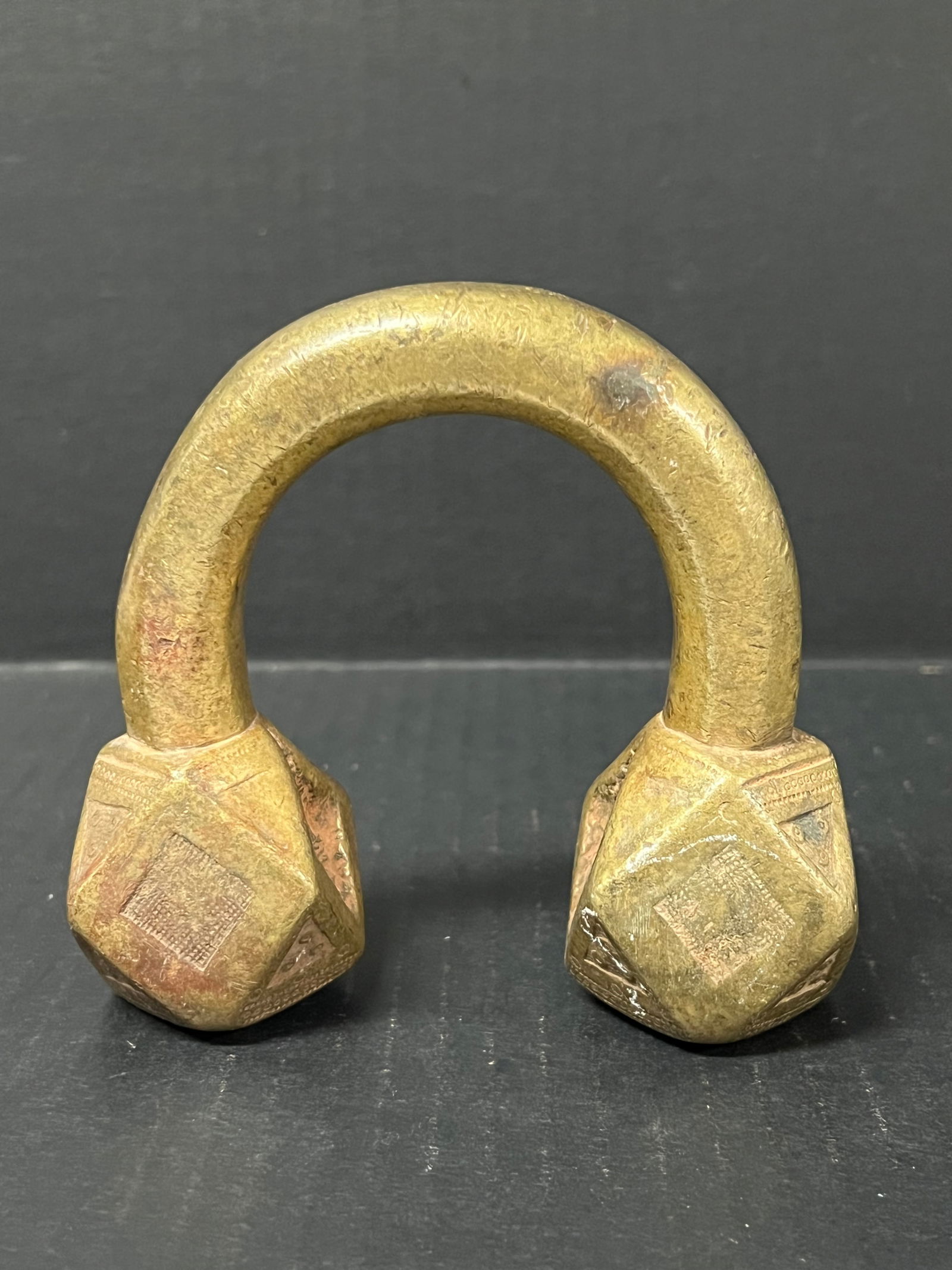 Nigerian Currency Bracelet - Tuareg: African Tribal Art Nigerian Currency Bracelet. The dimension is 4.5 inches high x 5 inches wide. Please be aware that some of the items are vintage, secondhand, old ages, antiques and may have a defec