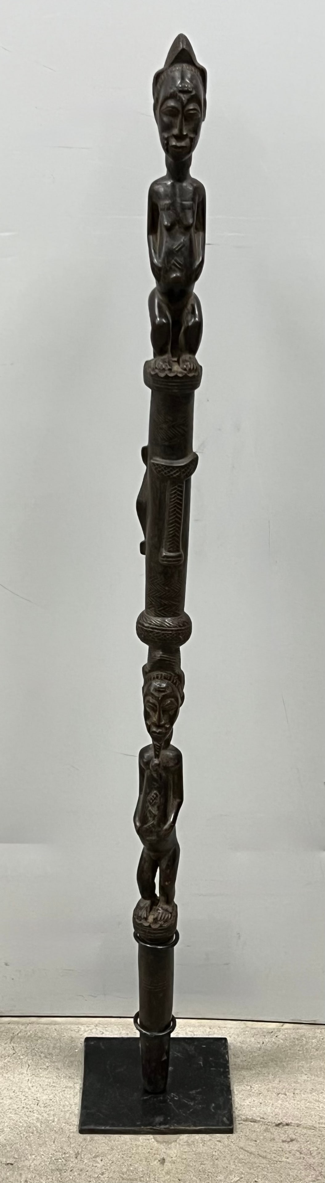 Baule Stick with Stand: African Tribal Art Baule Stick. The dimension is 35.5 inches high x 2 inches wide. Please be aware that some of the items are vintage, secondhand, old ages, antiques and may have a defects or sign of