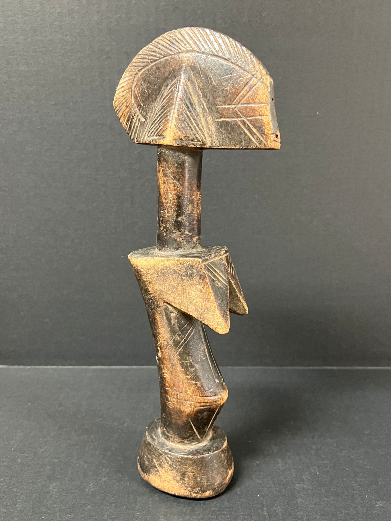 Mossi Fertility Doll: African Tribal Art Carved Wood Mossi Fertility Doll. The dimension is 11.5 inches high x 2 inches wide. Please be aware that some of the items are vintage, secondhand, old ages, antiques and may have