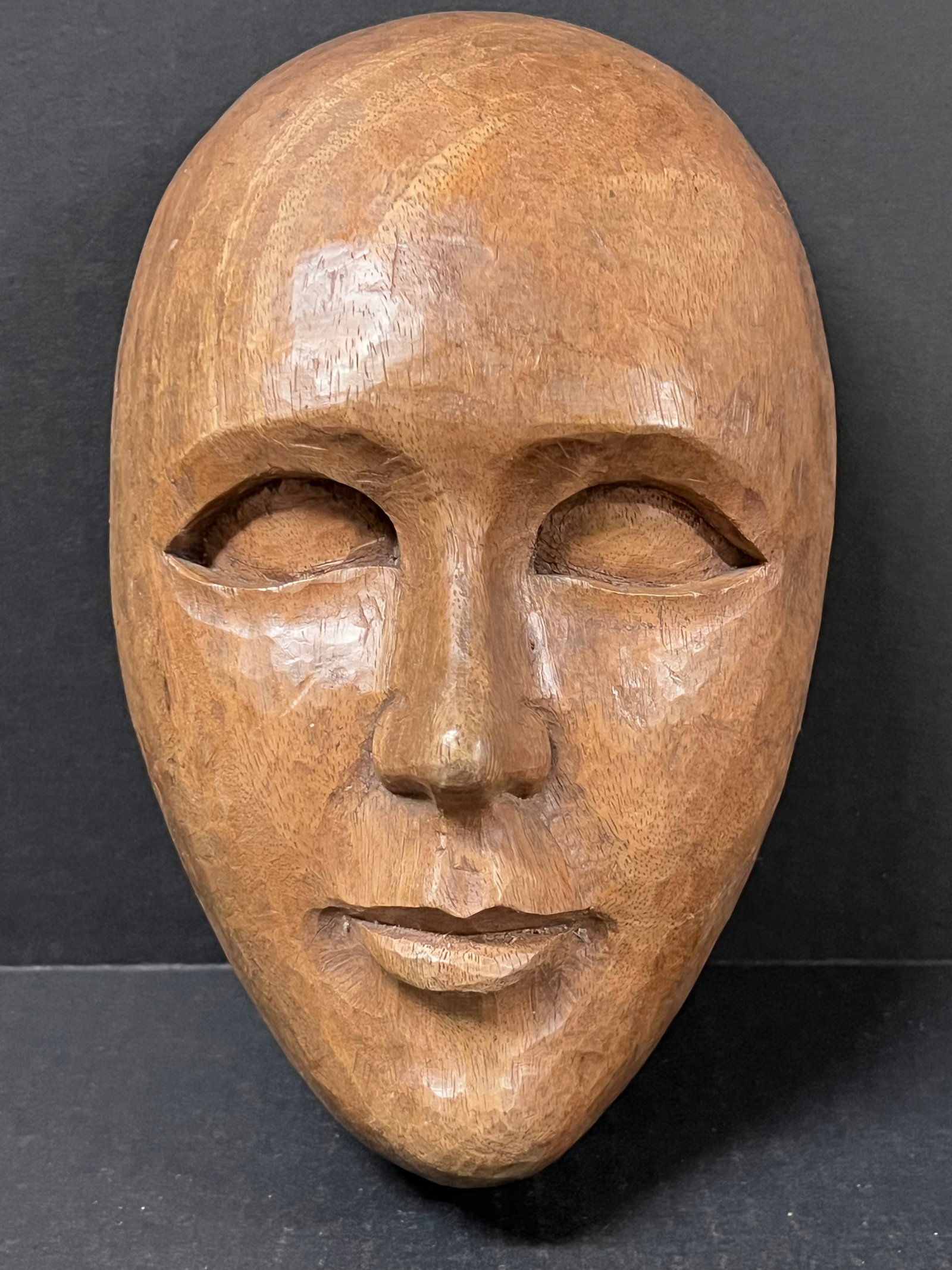 Carved Wood Male Face: Folk Art Carved Wood Male Face. The dimension is 9.25 inches high x 3.5 inches depth x 6 inches wide. Please be aware that some of the items are vintage, secondhand, old ages, antiques and may have a