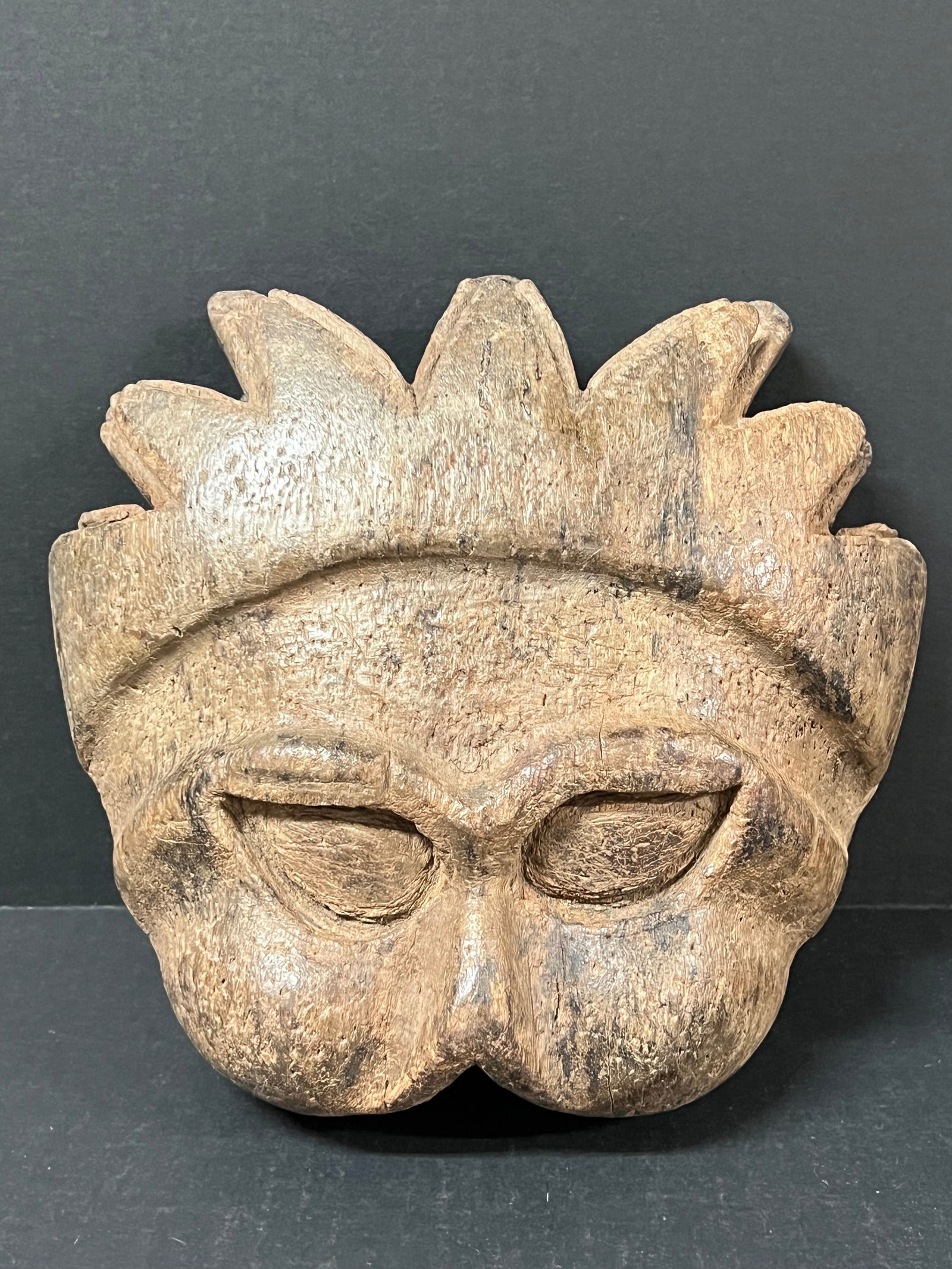 Carved Wood Masquerade Mask: Folk Art Carved Wood Masquerade Mask. The dimension is 8.5 inches high x 3 inches depth x 9 inches wide. Please be aware that some of the items are vintage, secondhand, old ages, antiques and may have