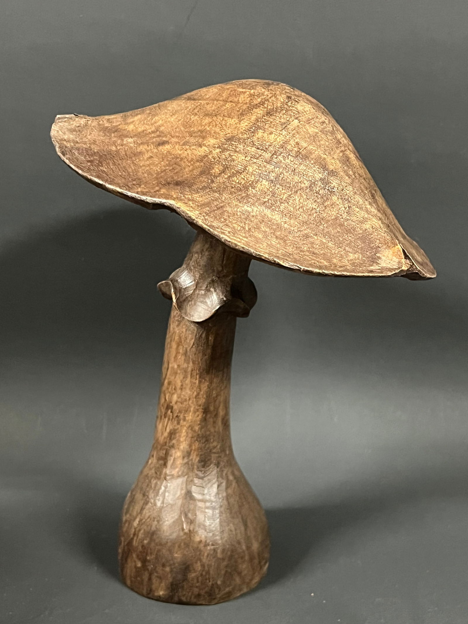 Carved Wood Mushroom: Folk Art Carved Wood Mushroom. The dimension is 8 inches high x 6 inches wide. Please be aware that some of the items are vintage, secondhand, old ages, antiques and may have a defects or sign of ages