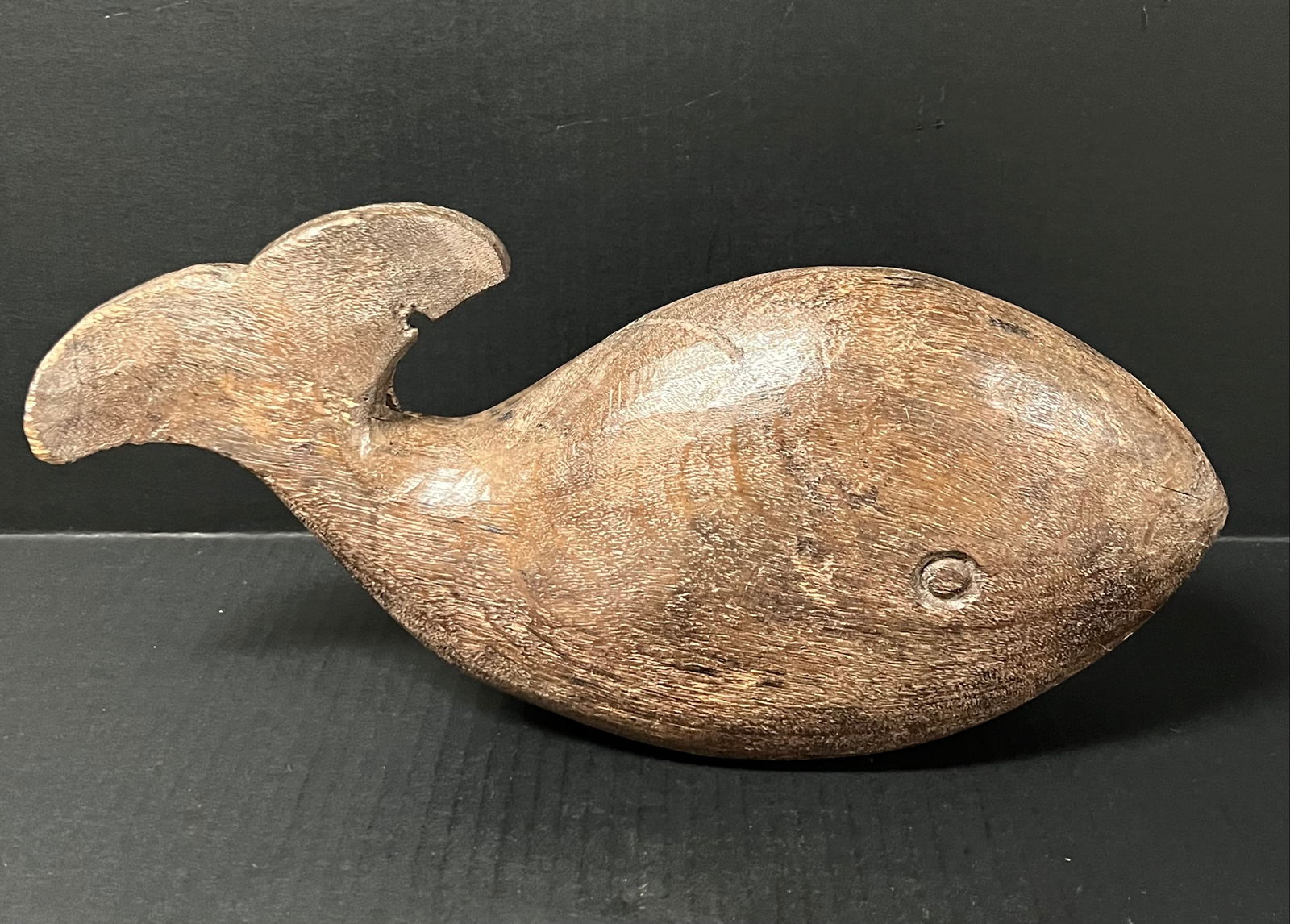 Whale Sculpture: Folk Art Carved Wood Whale Sculpture. The dimension is 5 inches high x 10.5 inches wide. Please be aware that some of the items are vintage, secondhand, old ages, antiques and may have a defects or si