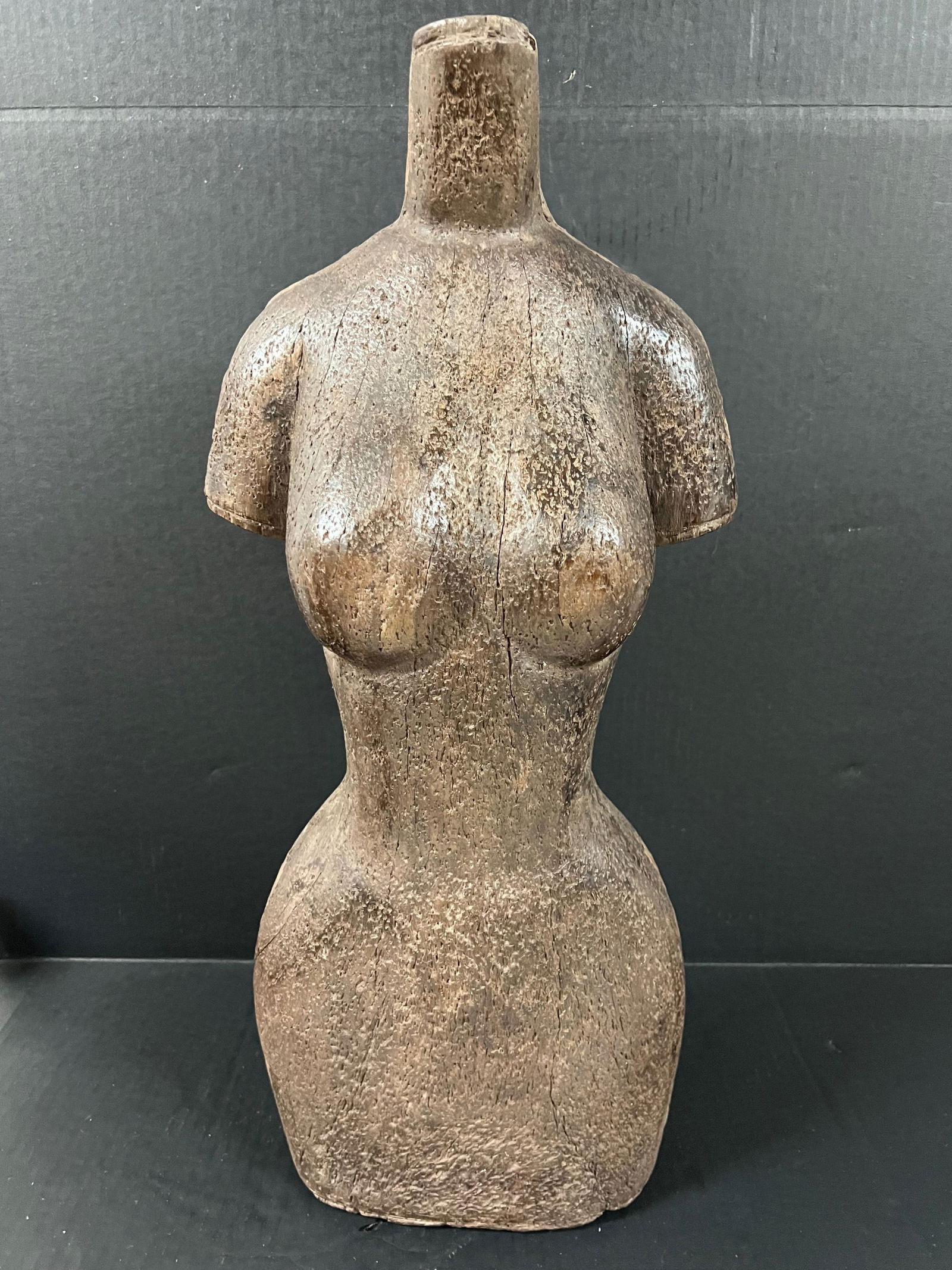 Large Female Torso Sculpture: Folk Art Carved Wood Large Female Torso Sculpture. The dimension is 24 inches high x 10 inches wide. Please be aware that some of the items are vintage, secondhand, old ages, antiques and may have a d