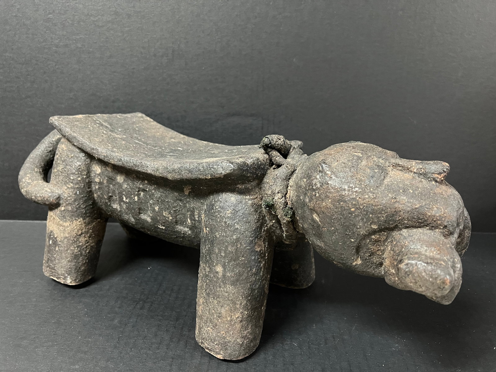 Baule Fish Stool: African Tribal Art Baule Fish Stool. The dimension is 7.5 inches high x 7 inches depth x 19 inches wide. Please be aware that some of the items are vintage, secondhand, old ages, antiques and may