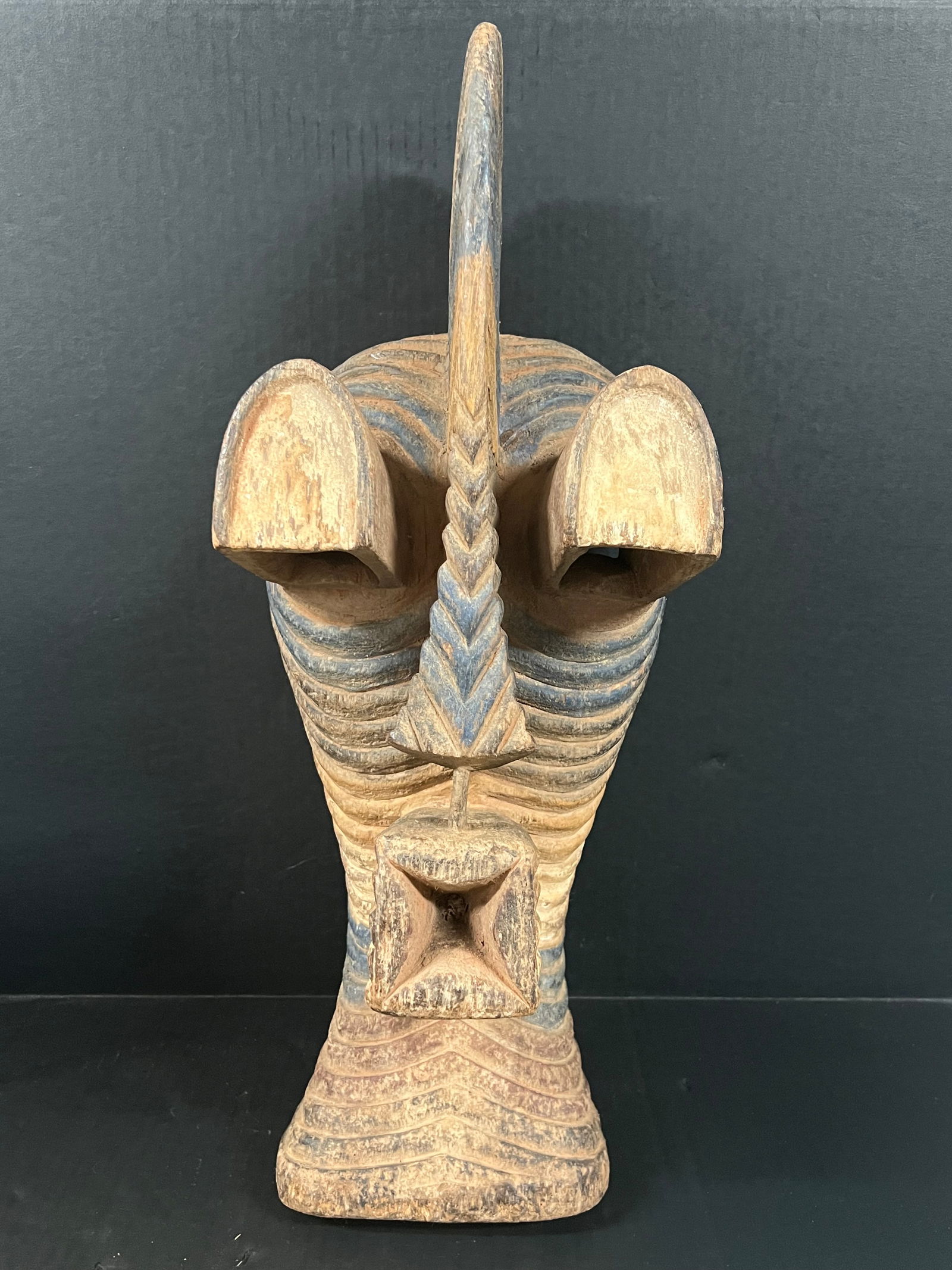 Large Songye Mask: African Tribal Art Large Songye Mask. The dimension is 22 inches high x 7.5 inches depth x 9 inches wide. Please be aware that some of the items are vintage, secondhand, old ages, antiques and may hav