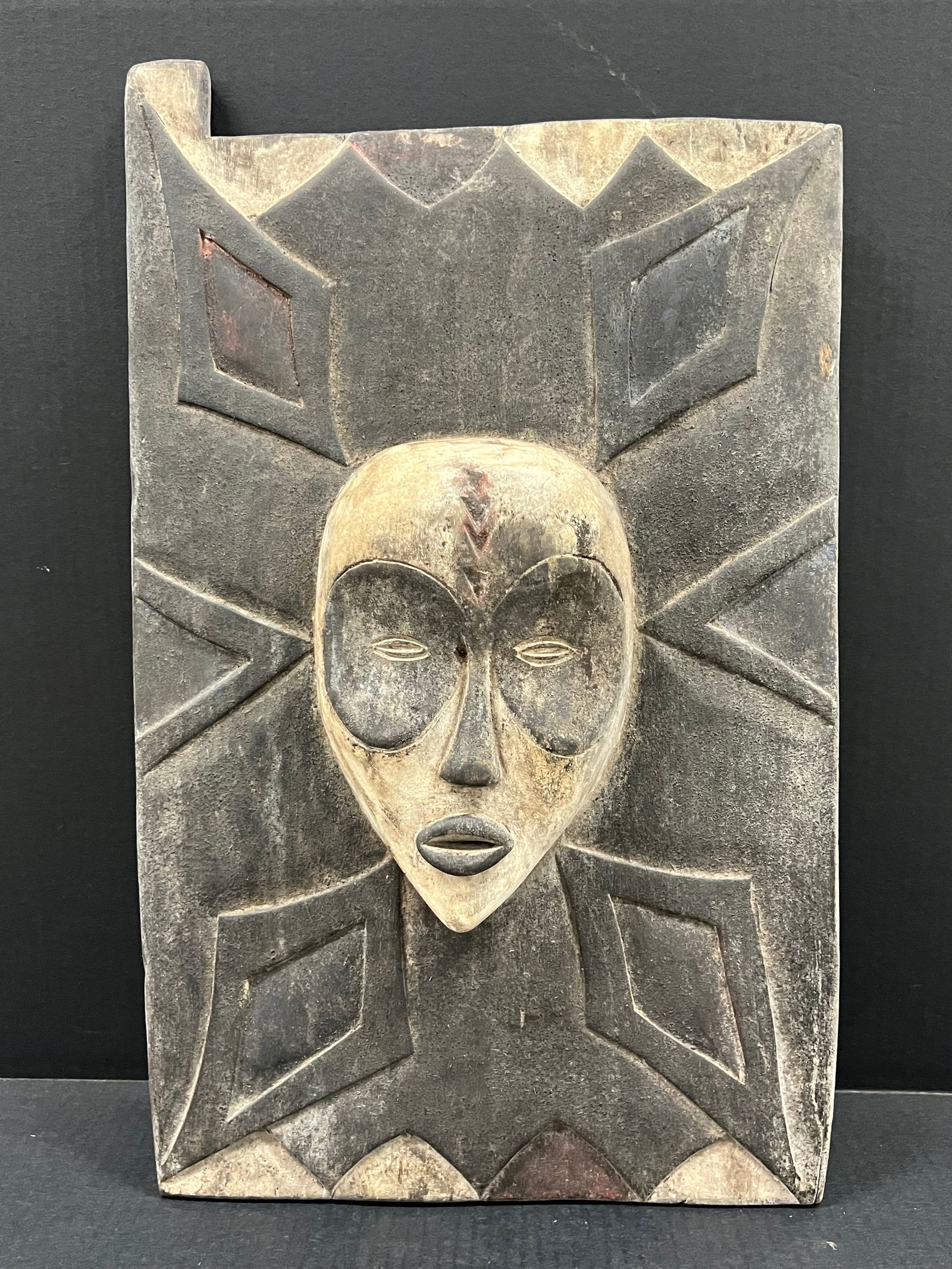 Fang Door/Window: African Tribal Art Fang Door. The dimension is 22.5 inches high x 14 inches wide. Please be aware that some of the items are vintage, secondhand, old ages, antiques and may have a defects or sign of a
