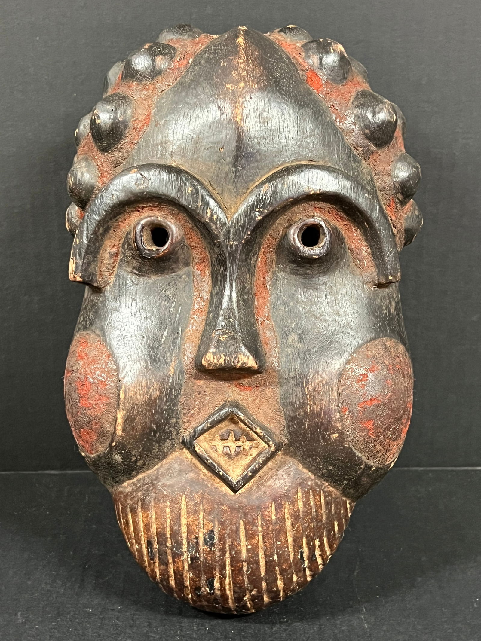 Bamun Mask: African Tribal Art Bamun Mask. The dimension is 13 inches high x 5 inches depth x 8 inches wide. Please be aware that some of the items are vintage, secondhand, old ages, antiques and may have a defec