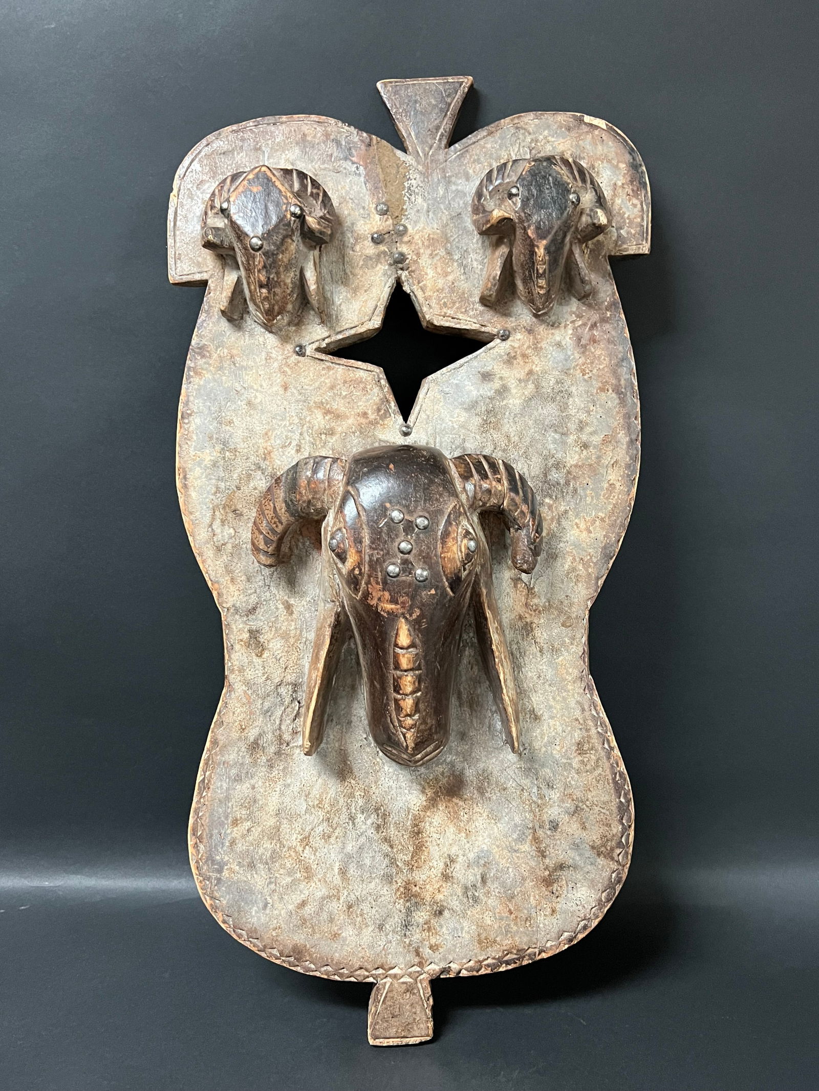 Baule Mask: African Tribal Art Baule Mask. The dimension is 26 inches high x 13 inches wide. Please be aware that some of the items are vintage, secondhand, old ages, antiques and may have a defects or sign of