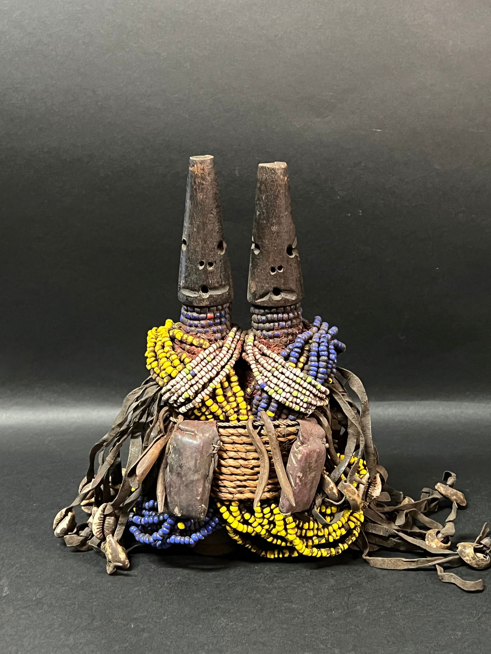 Namji Doll Beaded Statue: African Tribal Art Namji Doll Beaded Statue. The dimension is 9 inches high x 7 inches wide. Please be aware that some of the items are vintage, secondhand, old ages, antiques and may have a defects