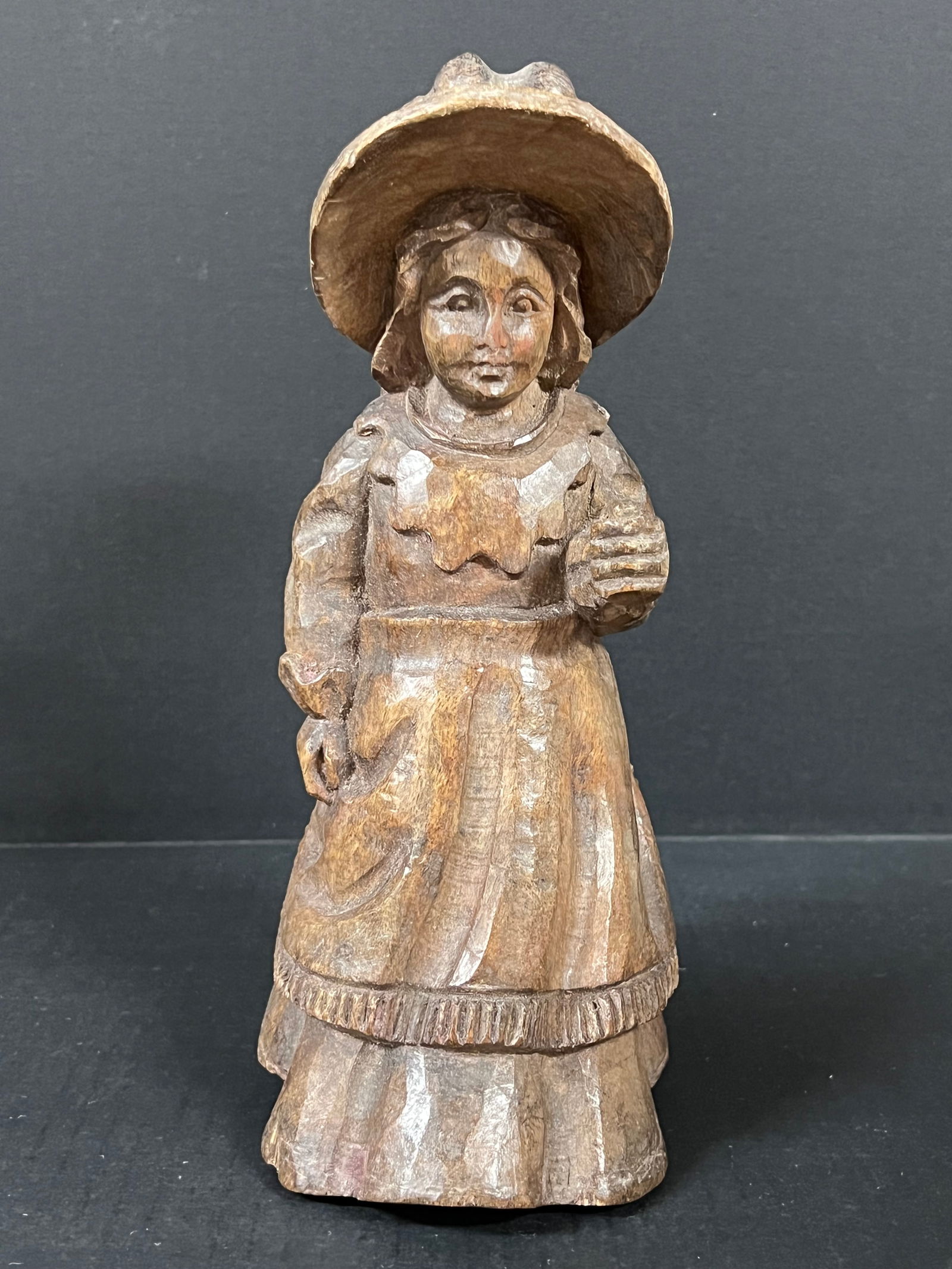 Carved Wood Young Girl: Decorative Art Carved Wood Papermache Mold of Young Girl. The dimension is 10 inches high x 6 inches depth x 4 inches wide. Please be aware that some of the items are vintage, secondhand, old ages, an
