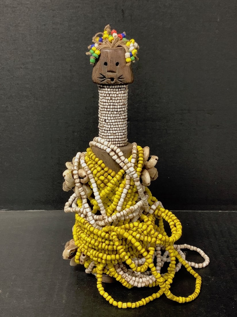Fertility Fali Beaded Doll: African Tribal Art Fertility Fali Beaded Doll. The dimension is 7.5 inches high x 3 inches wide. Please be aware that some of the items are vintage, secondhand, old ages, antiques and may have a