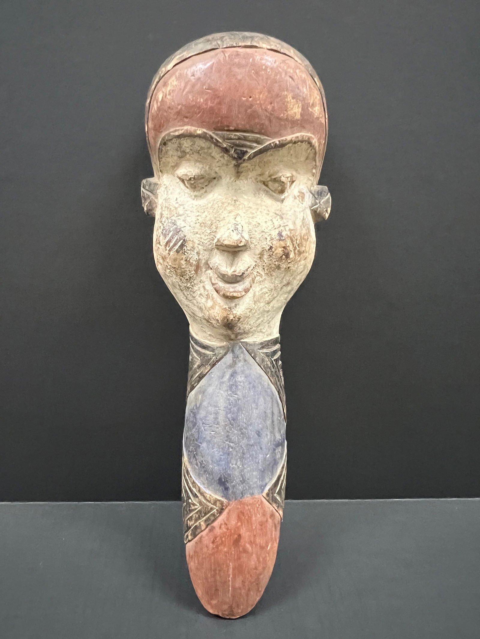 Pende Mask: African Tribal Art Pende Mask. The dimension is 19.5 inches high x 7 inches wide. Please be aware that some of the items are vintage, secondhand, old ages, antiques and may have a defects or sign of a