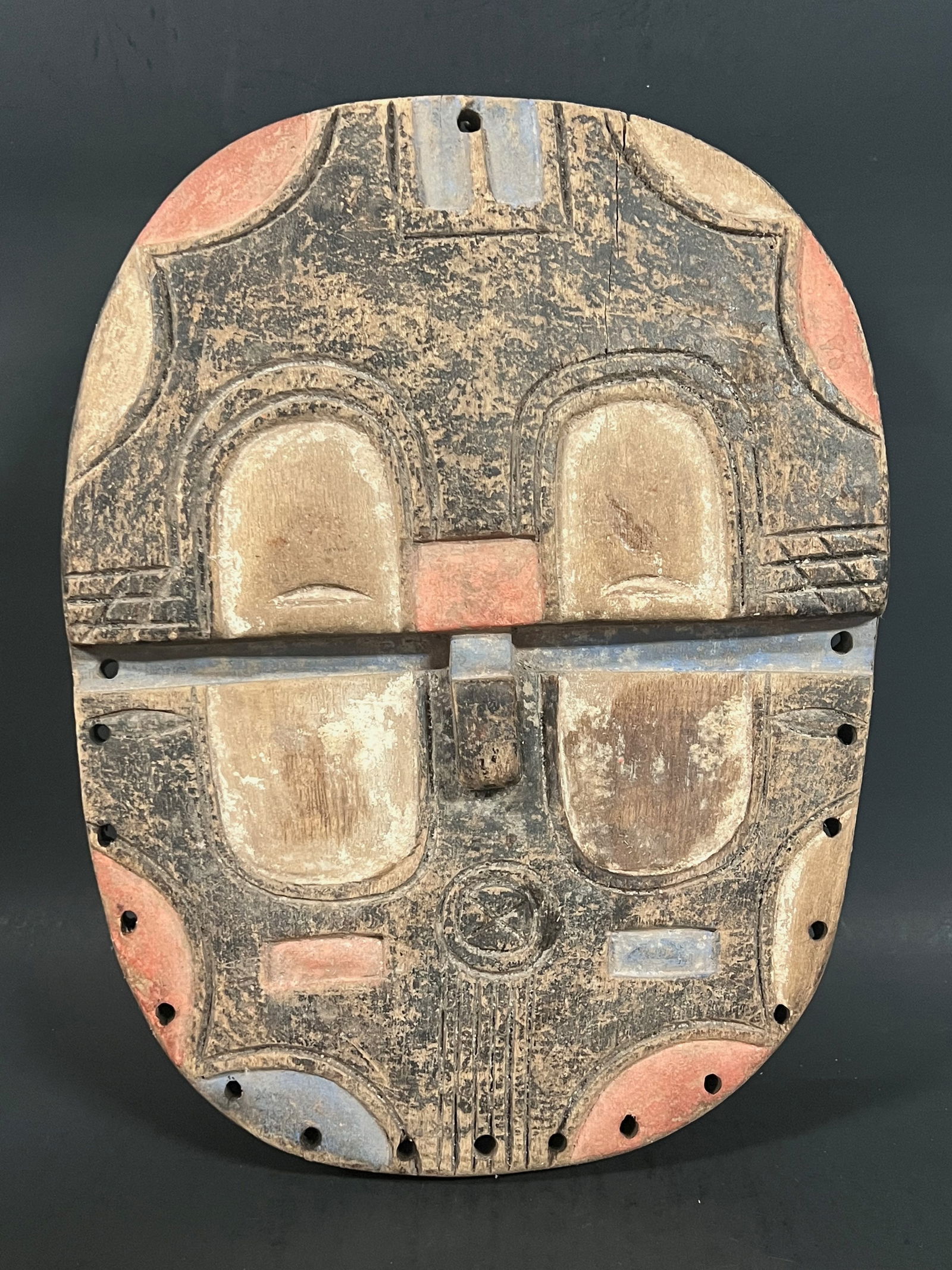 Teke Mask: African Tribal Art Teke Mask. The dimension is 13.5 inches high x 9.5 inches wide. Please be aware that some of the items are vintage, secondhand, old ages, antiques and may have a defects or sign of