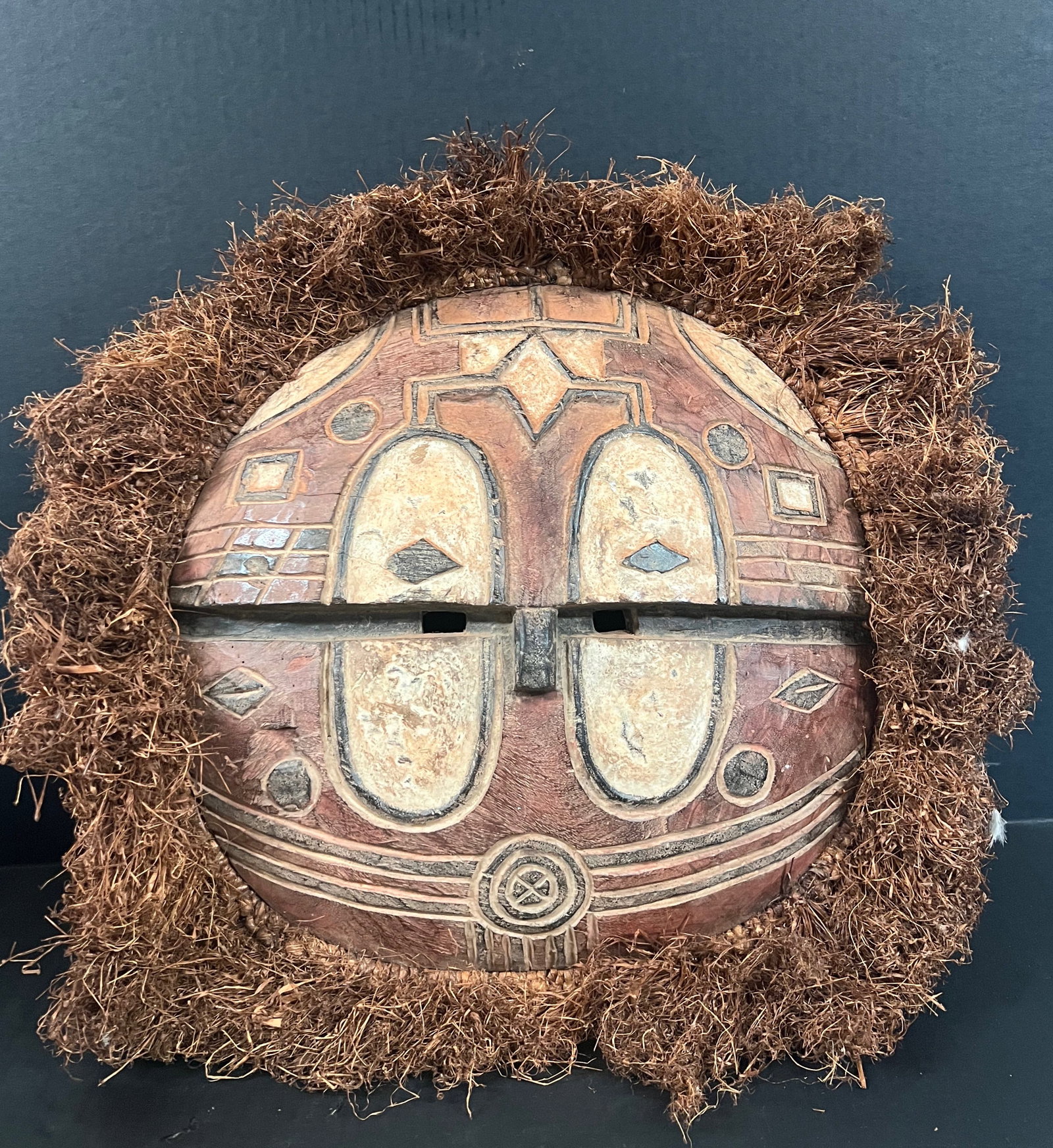 Teke Mask: African Tribal Art Teke Mask. The dimension is 14 inches high x 16 inches wide. Please be aware that some of the items are vintage, secondhand, old ages, antiques and may have a defects or sign of age