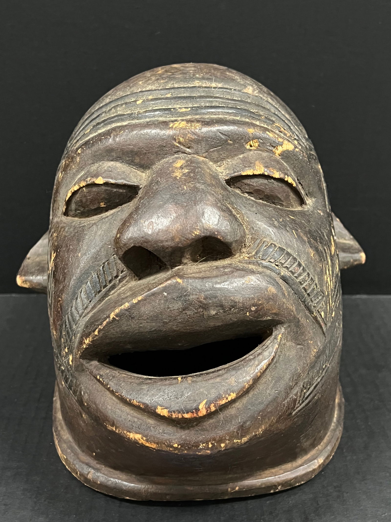Makonde Helmet Mask: African Tribal Art Makonde Helmet Mask. The dimension is 9 inches high x 8.5 inches wide. Please be aware that some of the items are vintage, secondhand, old ages, antiques and may have a defects or s
