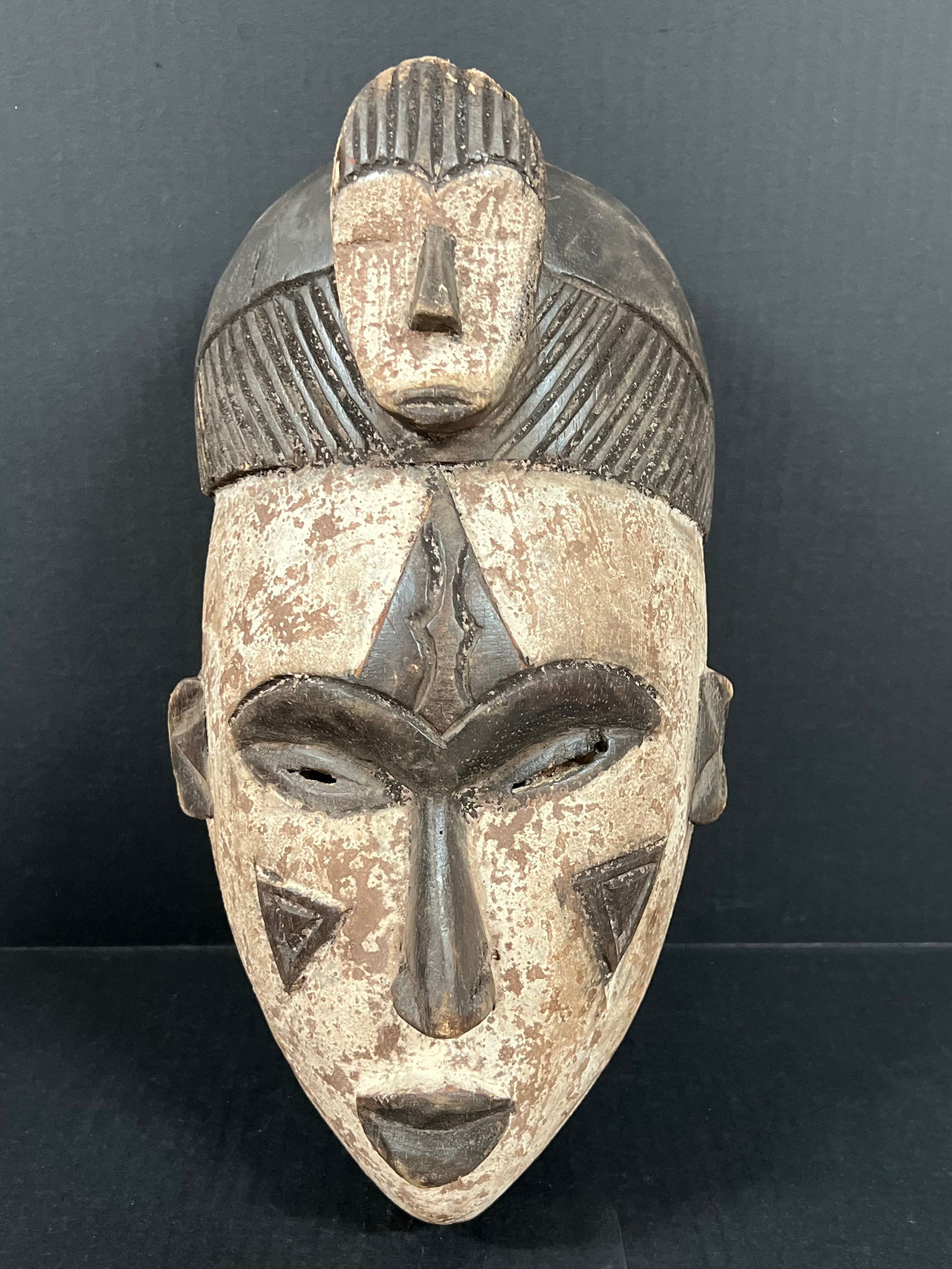 Ibo Mask: African Tribal Art Ibo Mask. The dimension is 15 inches high x 8 inches wide. Please be aware that some of the items are vintage, secondhand, old ages, antiques and may have a defects or sign of ages,