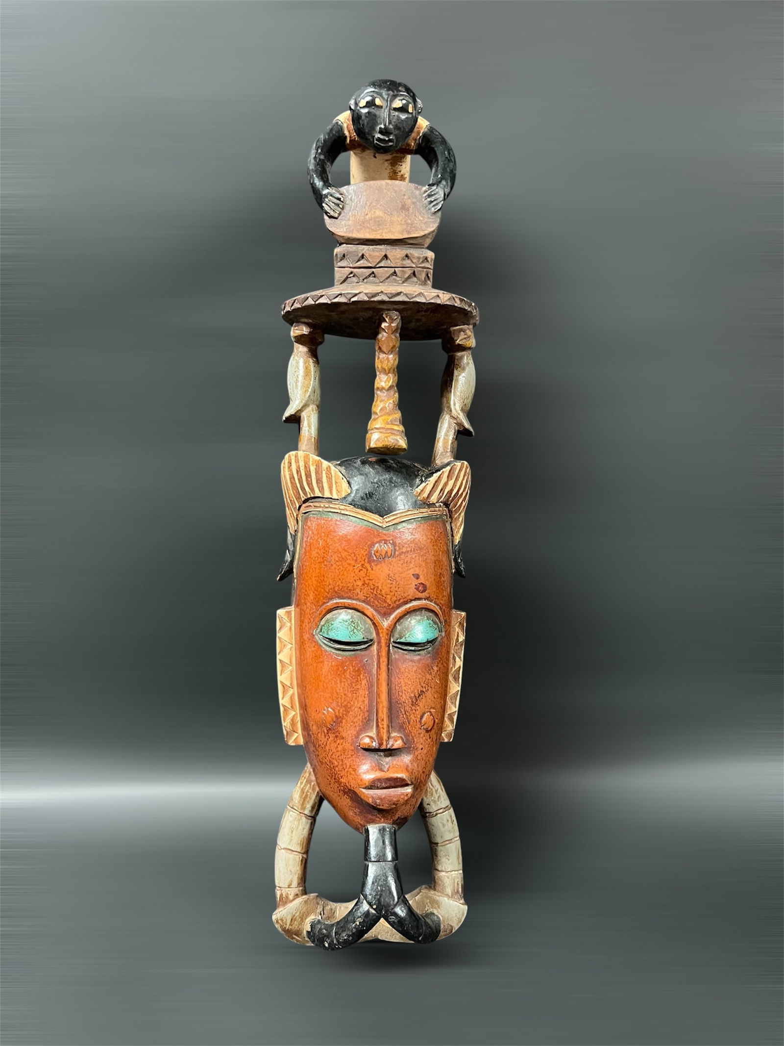 Guru Mask: African Tribal Art Guru Mask. The dimension is 18 inches high x 4.5 inches wide. Please be aware that some of the items are vintage, secondhand, old ages, antiques and may have a defects or sign of