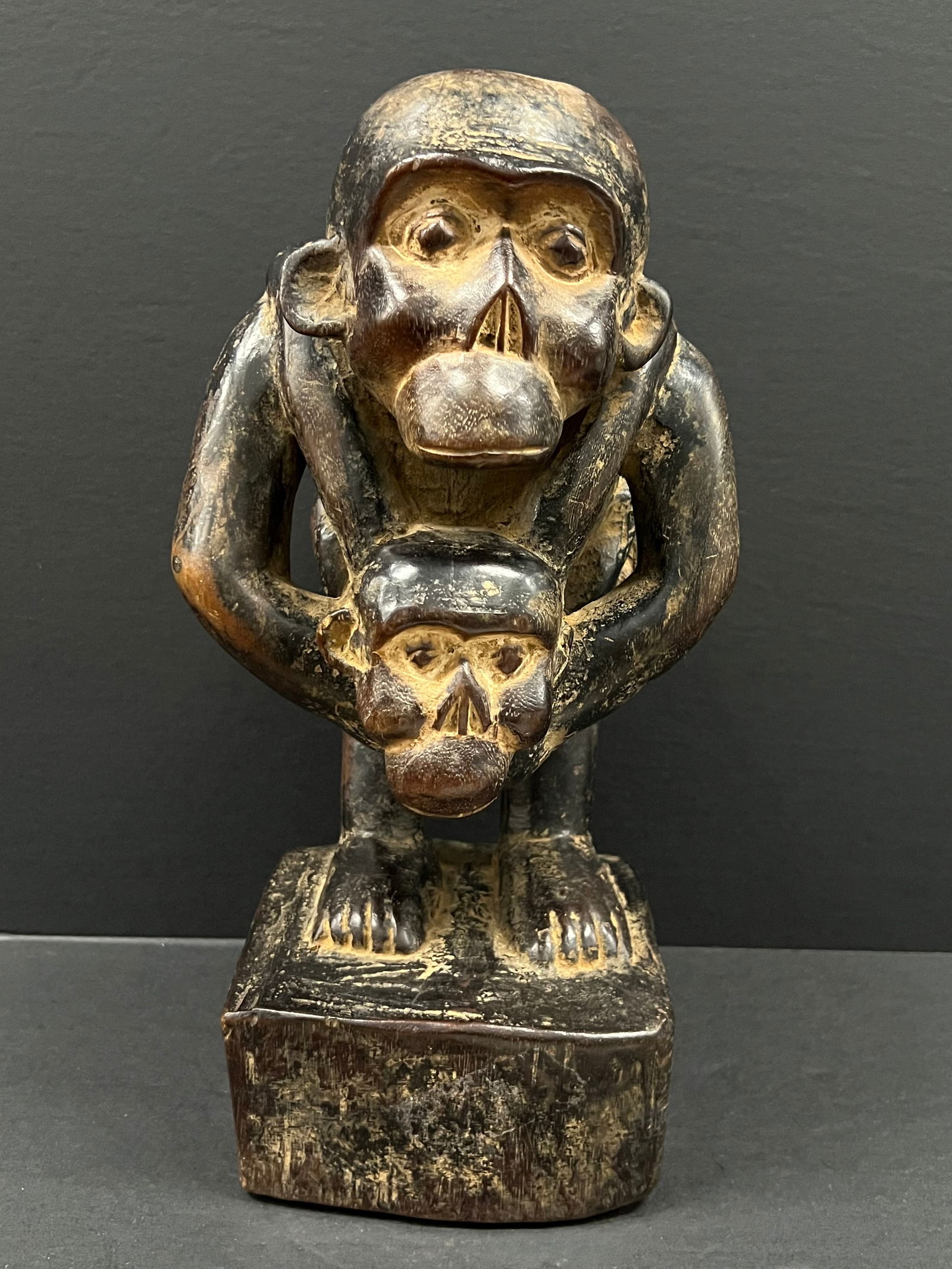 Bulu Monkey Statue: African Tribal Art Bulu Monkey Statue. The dimension is 14 inches high x 8 inches depth x 7 inches wide. Please be aware that some of the items are vintage, secondhand, old ages, antiques and may
