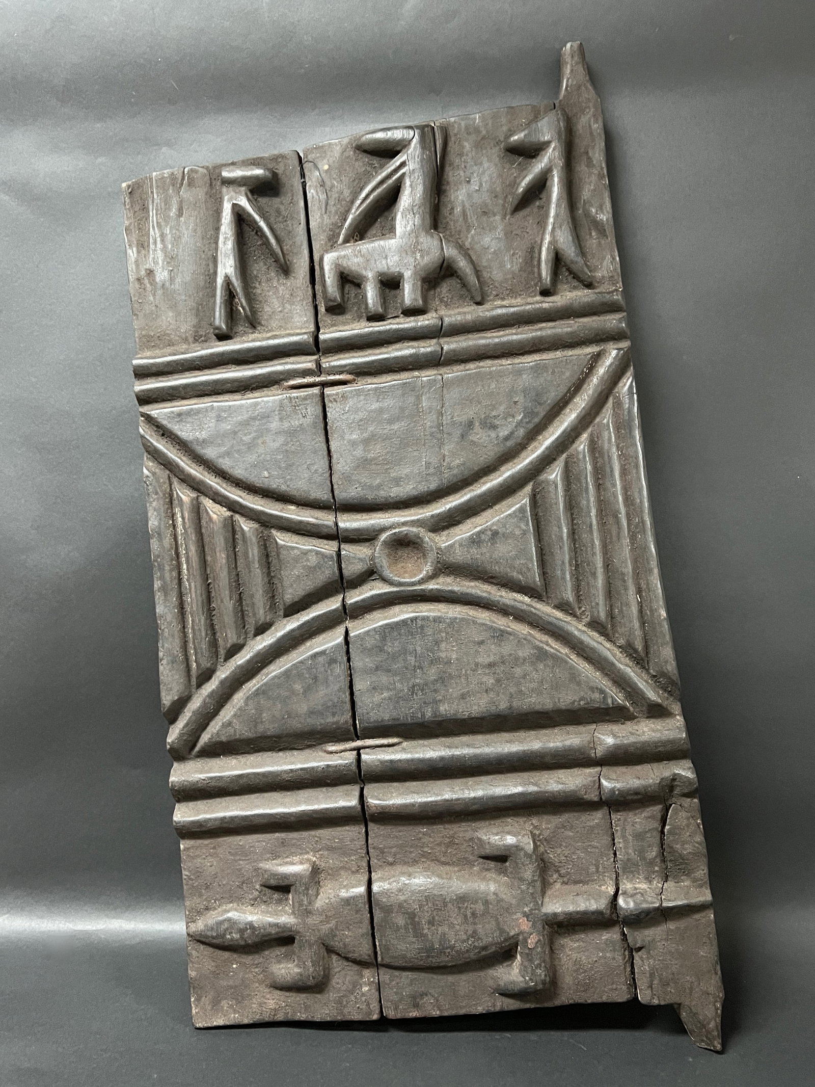 Dogon Door: African Tribal Art Dogon Door. The dimension is 31.5 inches high x 16 inches wide. Please be aware that some of the items are vintage, secondhand, old ages, antiques and may have a defects or sign