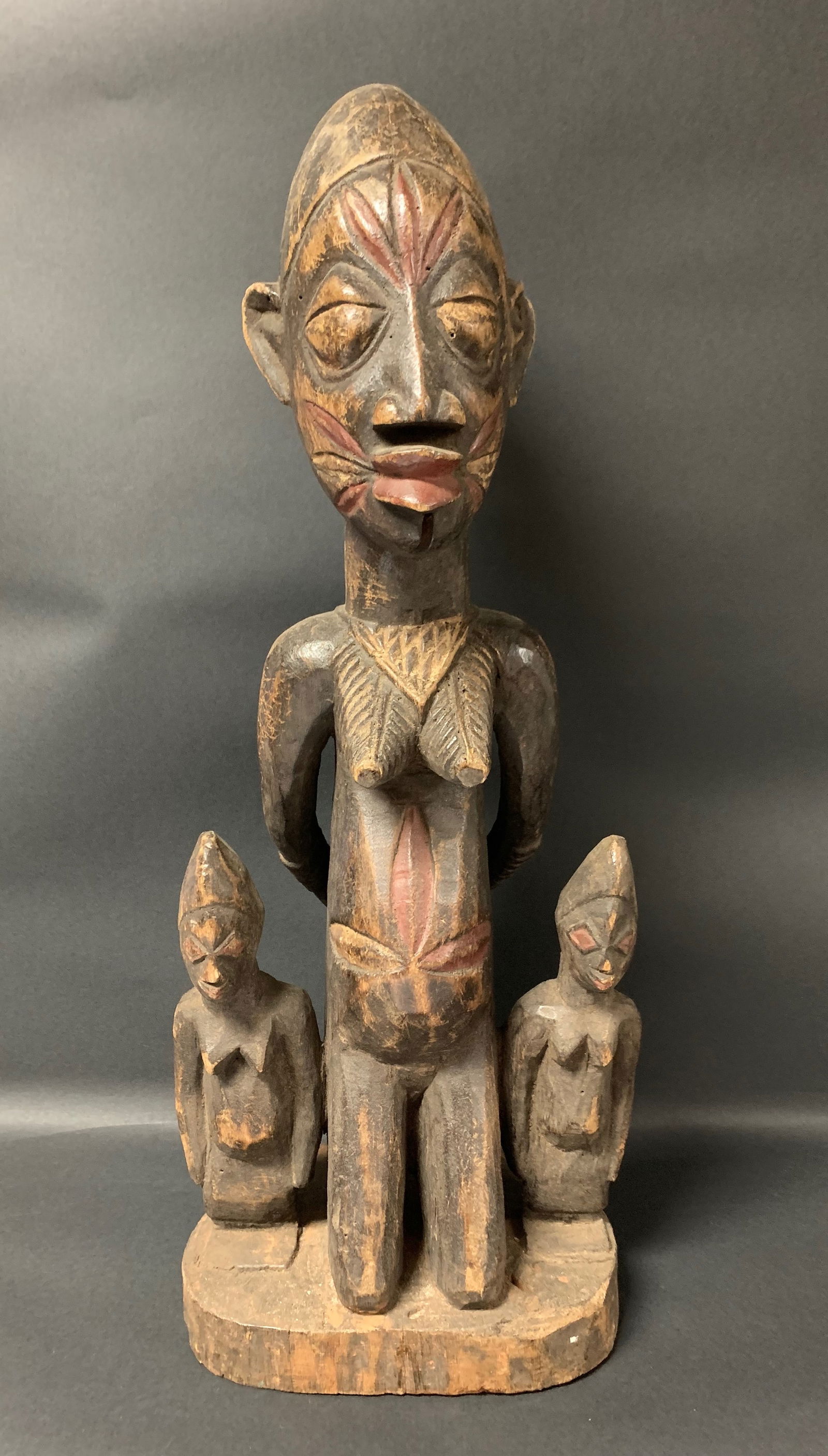 Yuroba Statue: African Tribal Art Yuroba Statue. The dimension is 23.75 inches high x 9.75 inches wide. Please be aware that some of the items are vintage, secondhand, old ages, antiques and may have a defects or