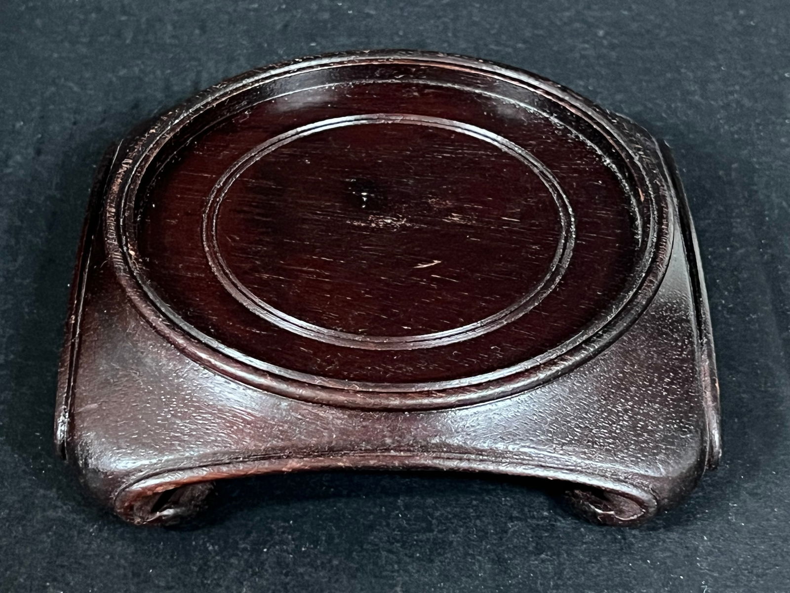 Wooden Stand: Chinese Art Wooden Stand. The dimension is 1.5 inches high x 5.75 inches wide. Please be aware that some of the items are vintage, secondhand, old ages, antiques and may have a defects or sign of