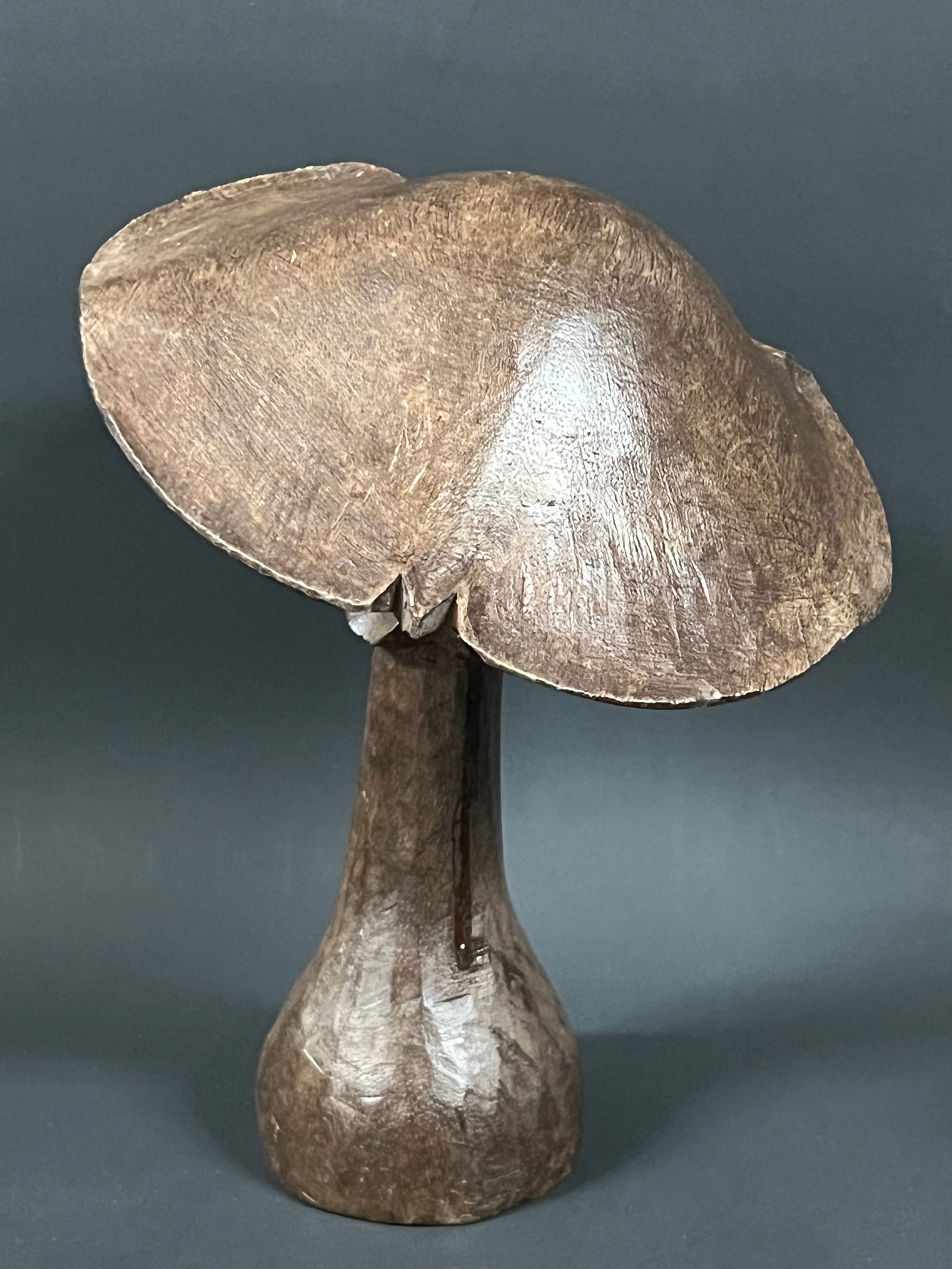 Carved Wood Mushroom: Folk Art Carved Wood Mushroom. The dimension is 8 inches high x 6 inches wide. Please be aware that some of the items are vintage, secondhand, old ages, antiques and may have a defects or sign of