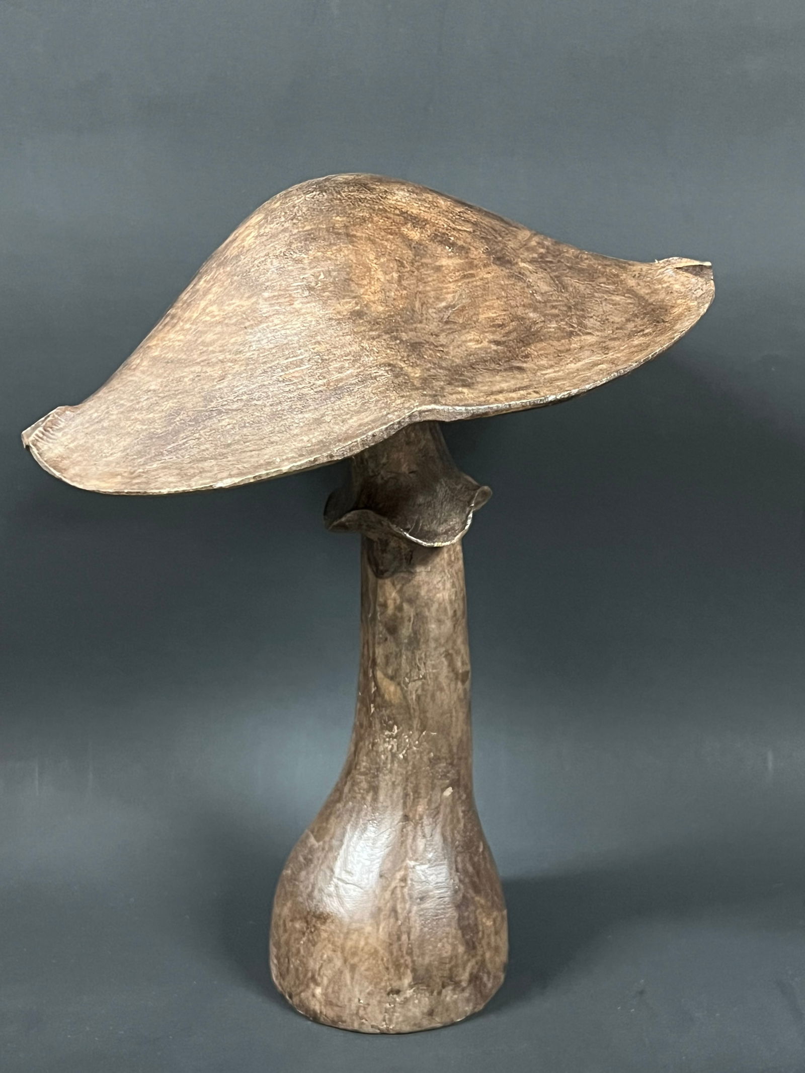 Carved Wood Mushroom: Folk Art Carved Wood Mushroom. The dimension is 10 inches high x 8 inches wide. Please be aware that some of the items are vintage, secondhand, old ages, antiques and may have a defects or sign of
