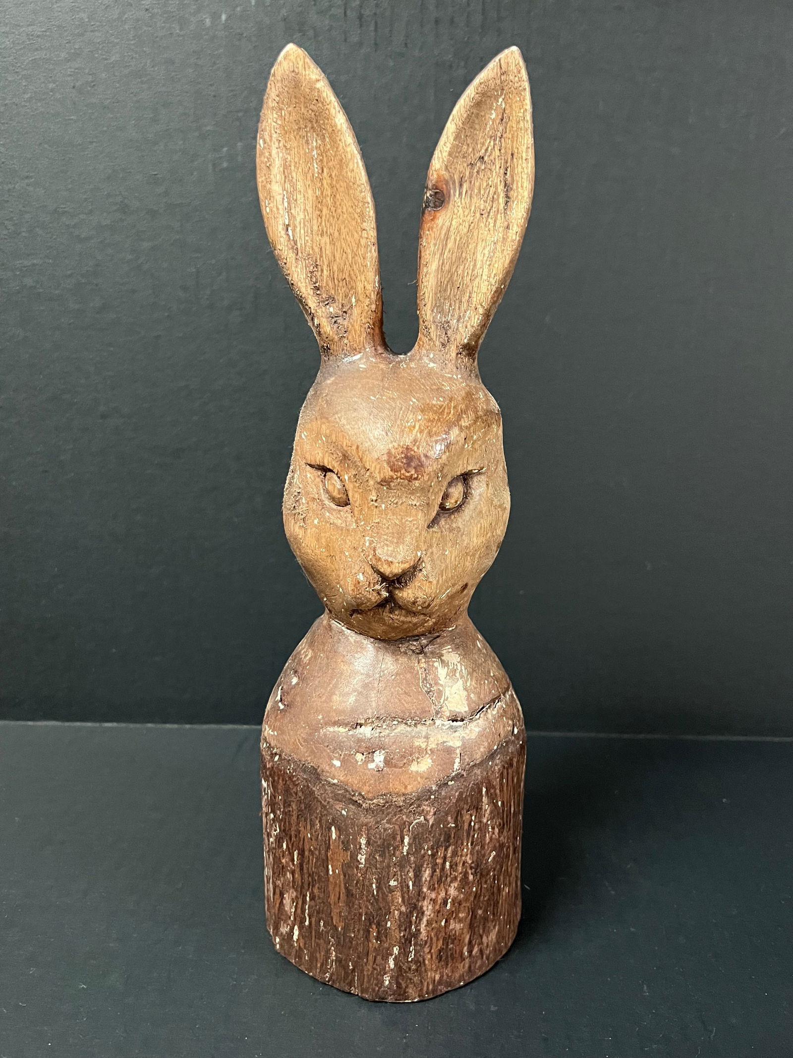 Rabbit Sculpture: Folk Art Carved Wood Rabbit Sculpture. The dimension is 13 inches high x 4 inches wide. Please be aware that some of the items are vintage, secondhand, old ages, antiques and may have a defects or sig