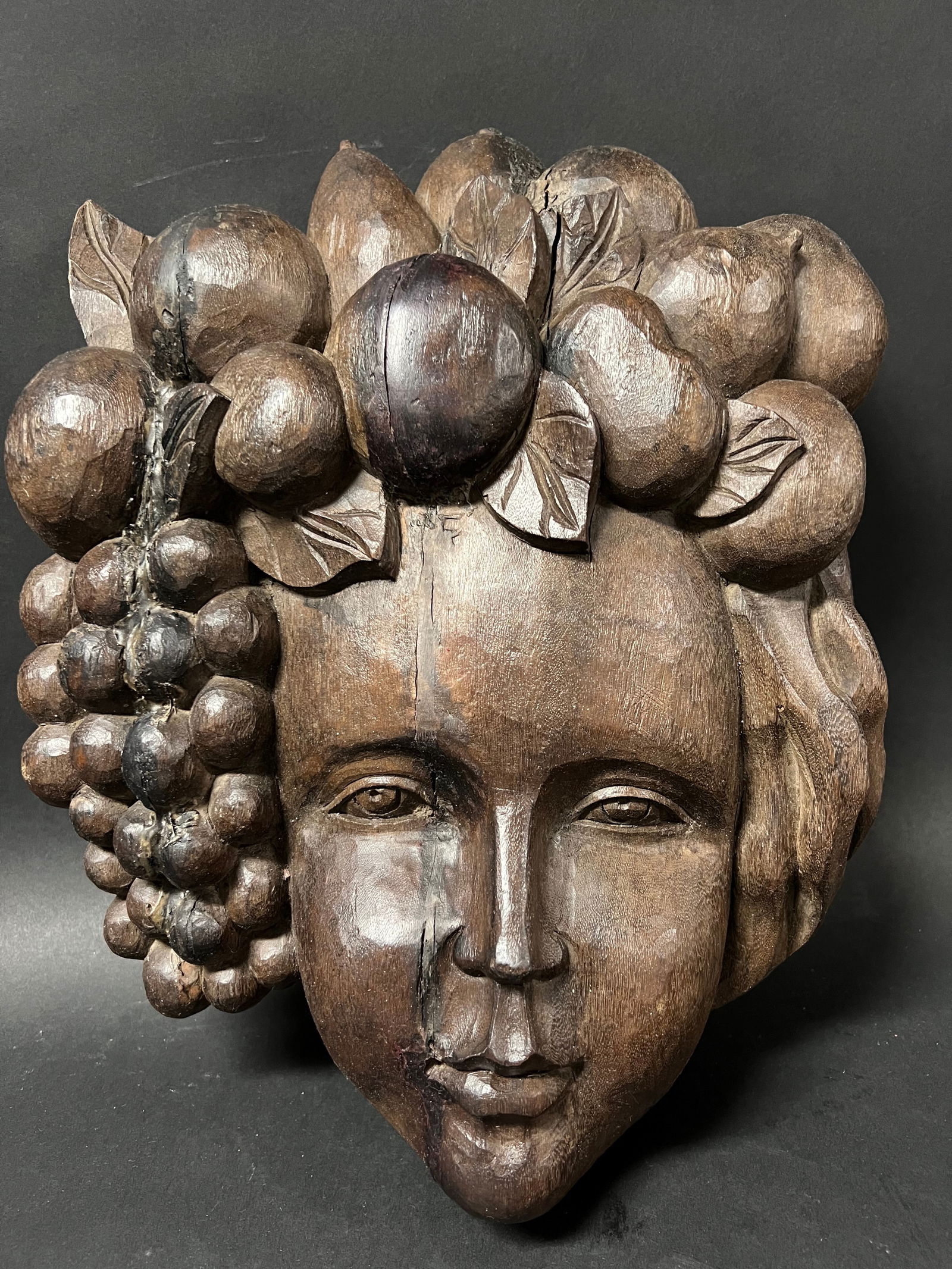 Eve Face Wall Sculpture: Folk Art Carved Wood Eve Face Wall Sculpture. The dimension is 19 inches high x 10 inches wide. Please be aware that some of the items are vintage, secondhand, old ages, antiques and may have a