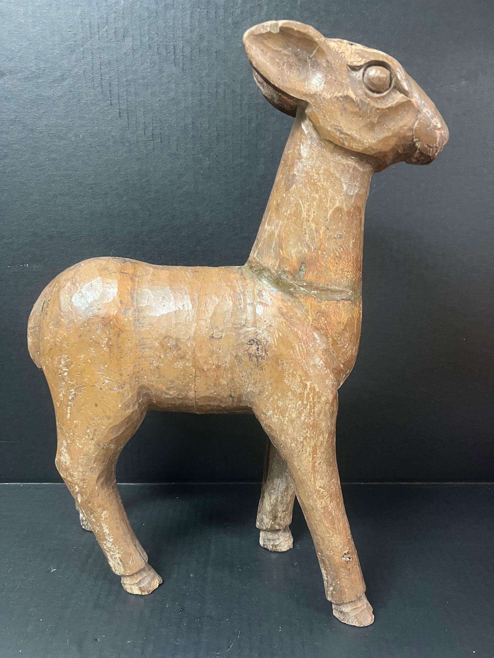 Large Deer Sculpture: Folk Art Carved Wood Large Deer Sculpture. The dimension is 17.5 inches high x 13 inches wide. Please be aware that some of the items are vintage, secondhand, old ages, antiques and may have a